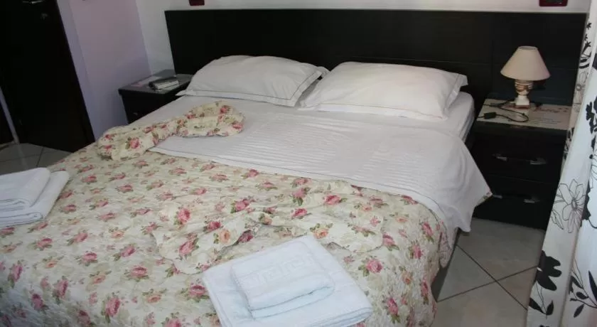 Bed in Jolly City Center Hotel