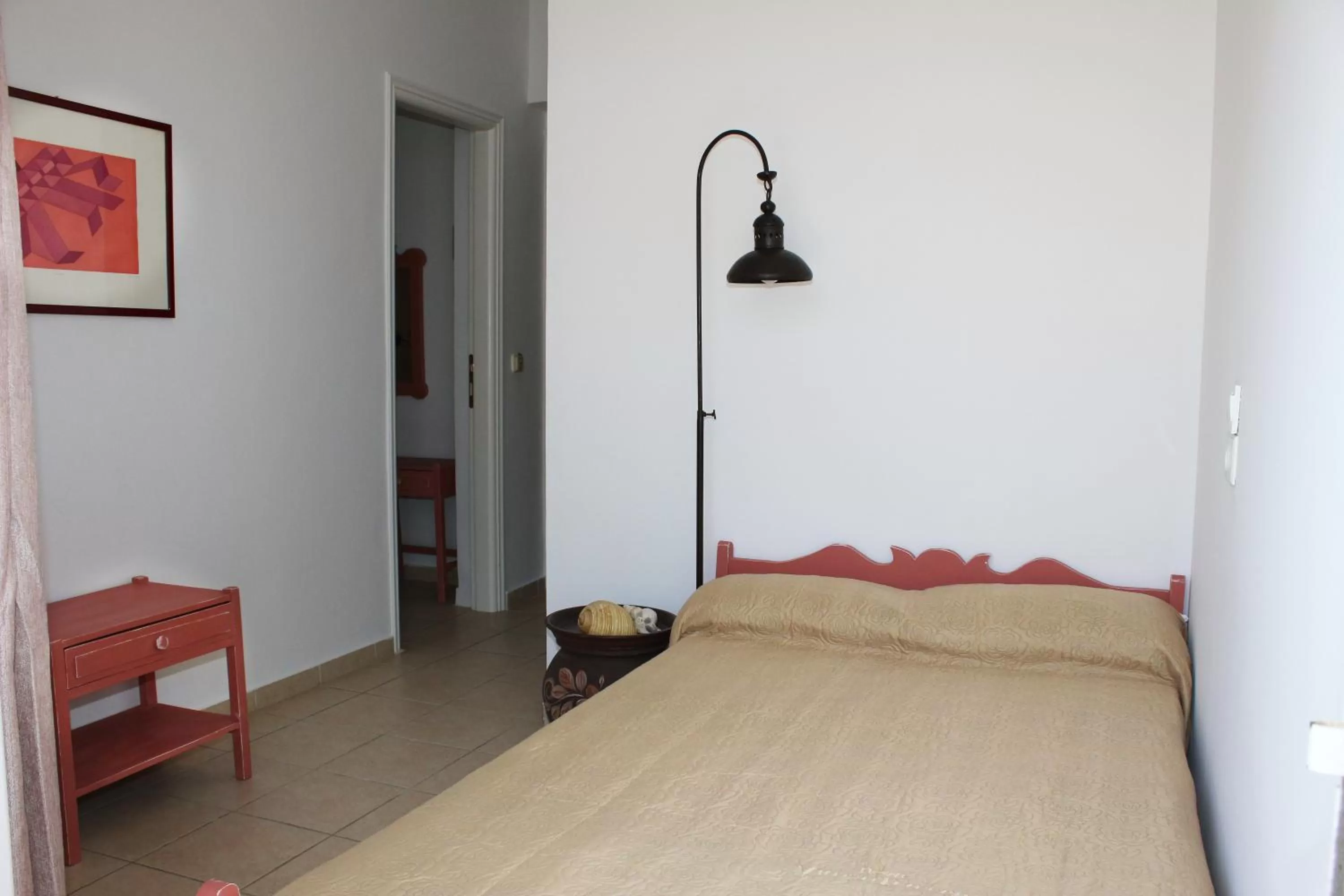 Bed in Ikaros Art Hotel