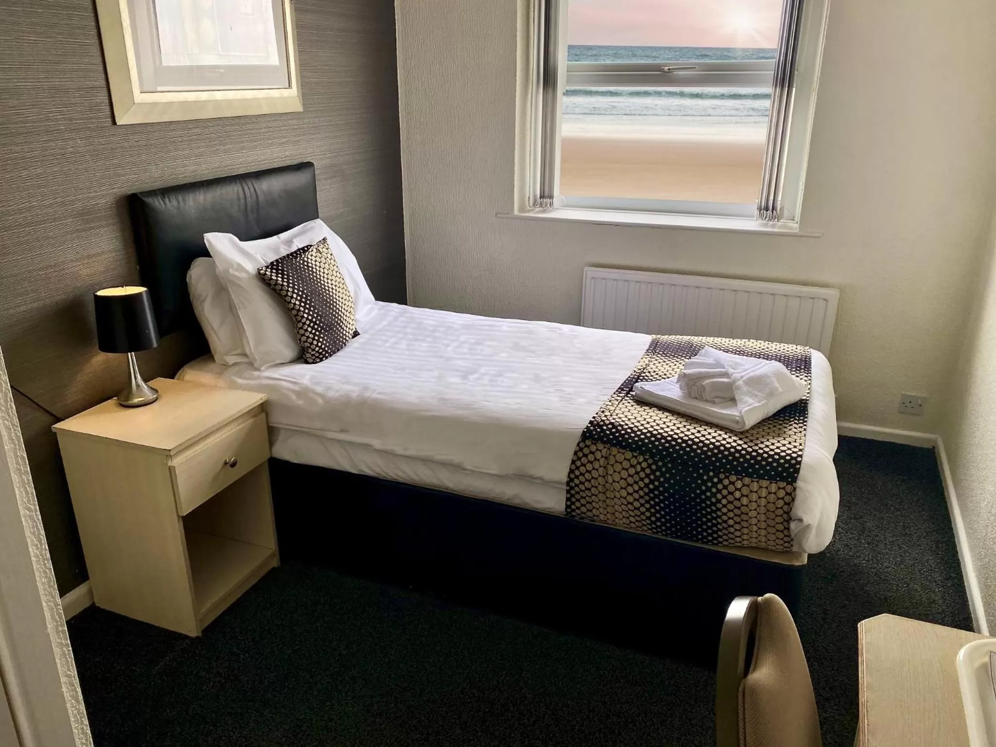 Bed in Royal Seabank Hotel