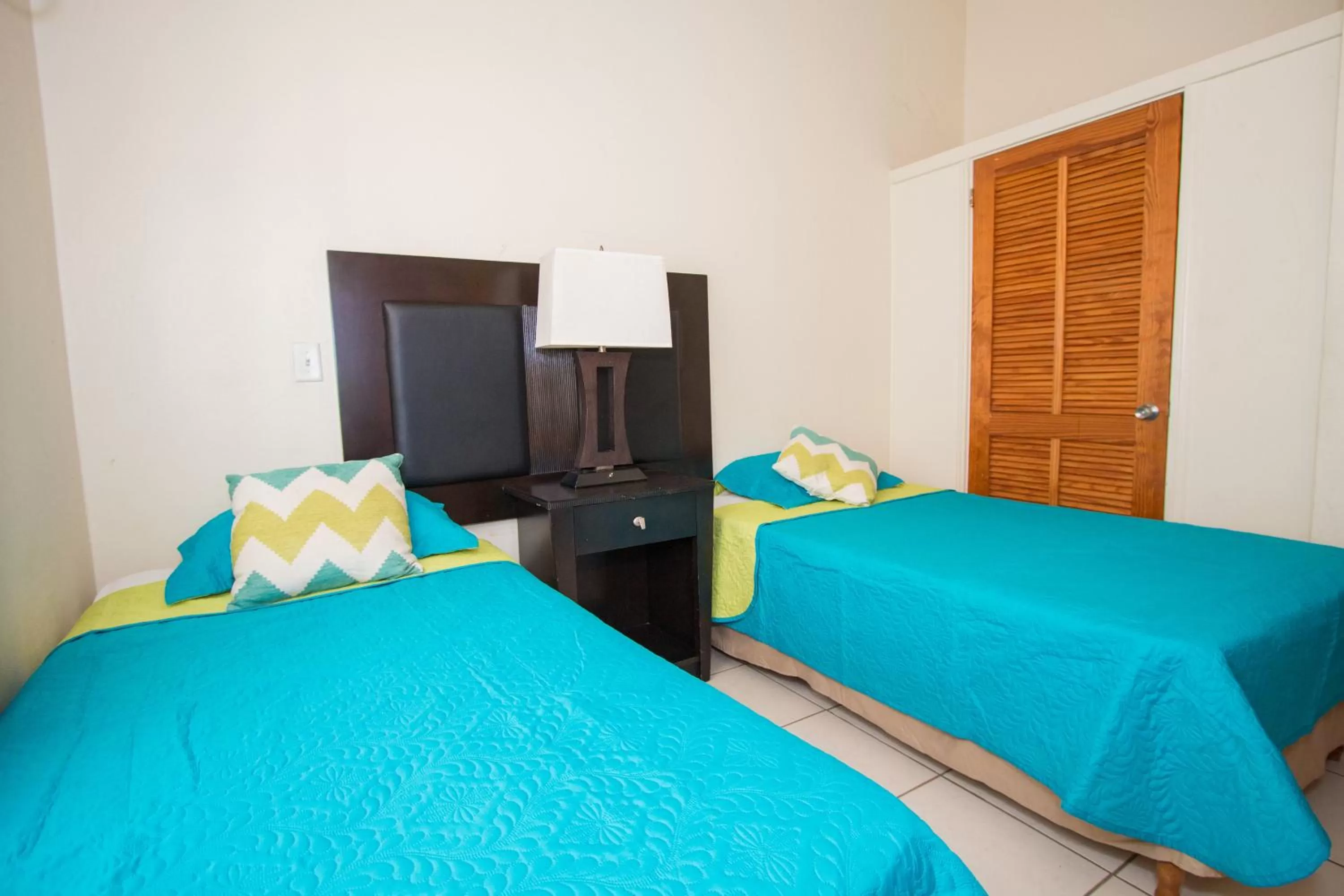 Bed in Connie's Comfort Suites