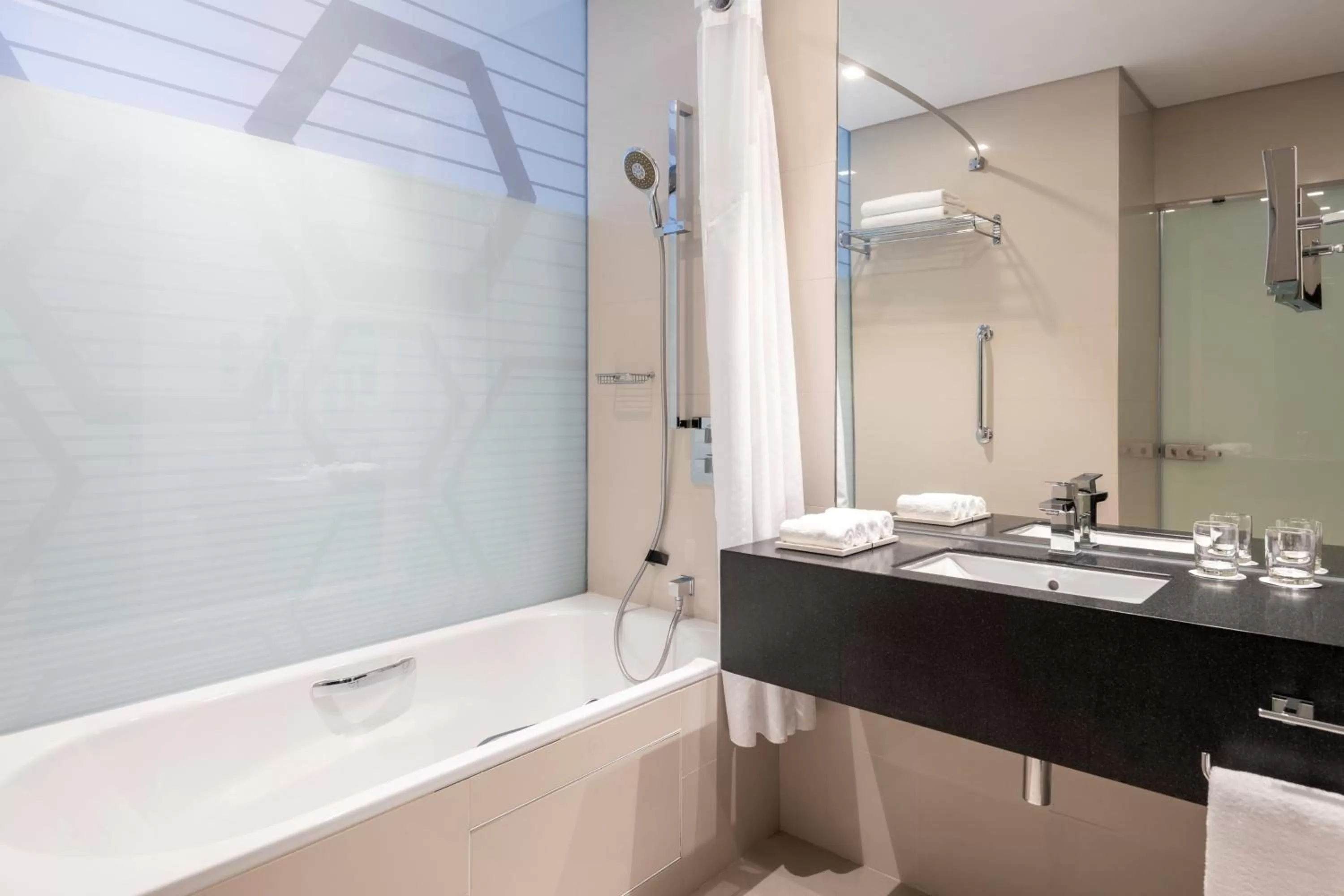 Bathroom in Holiday Inn - Doha - The Business Park by IHG