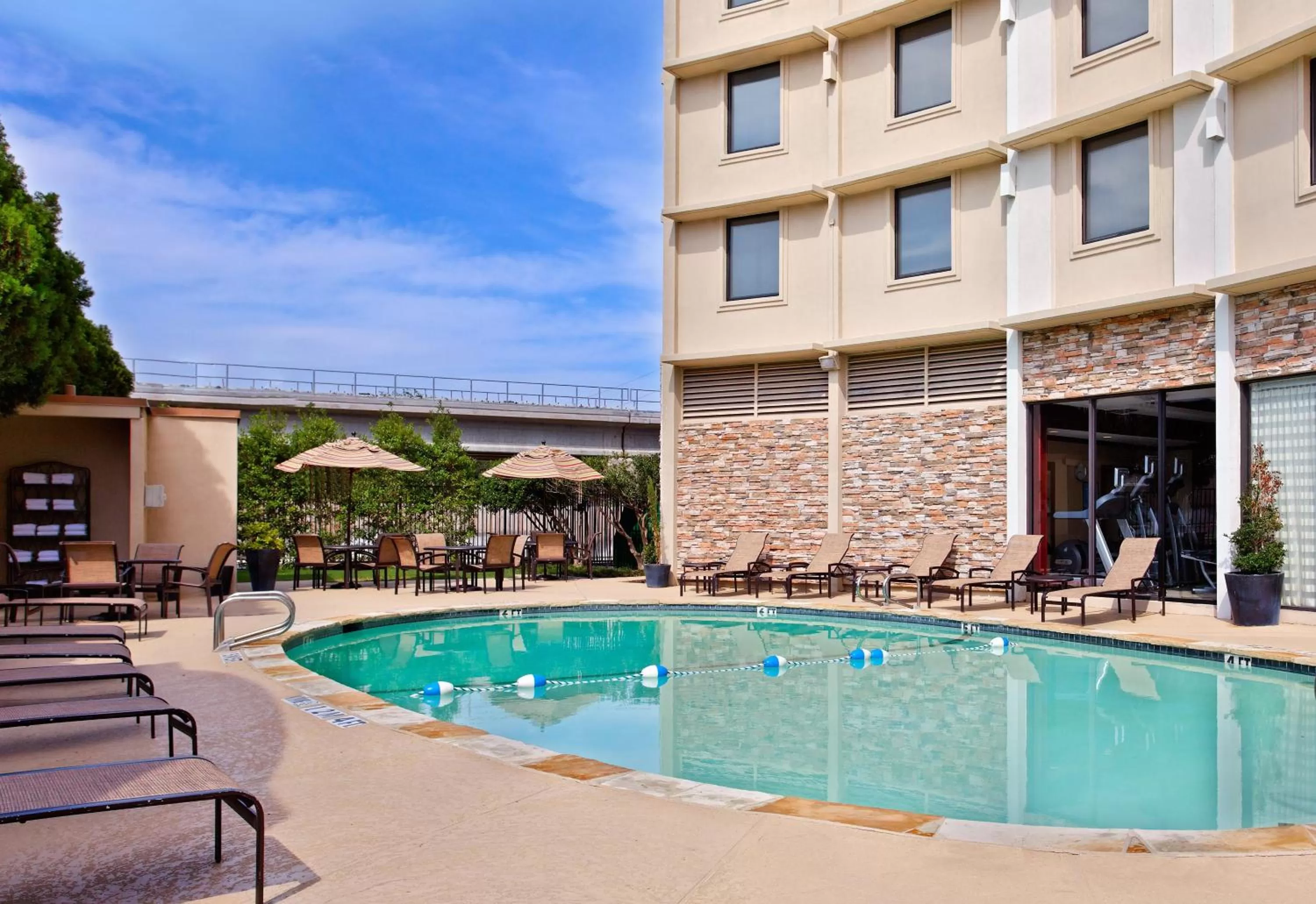 Swimming pool in Holiday Inn Express Dallas Market Center by IHG