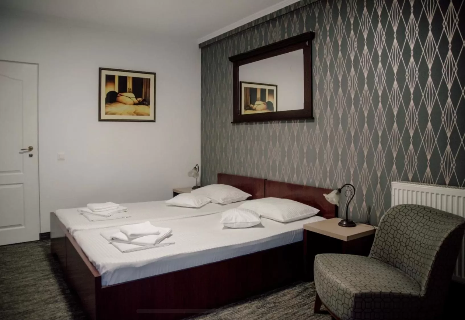 Bed in Carnival City Hotel Oradea