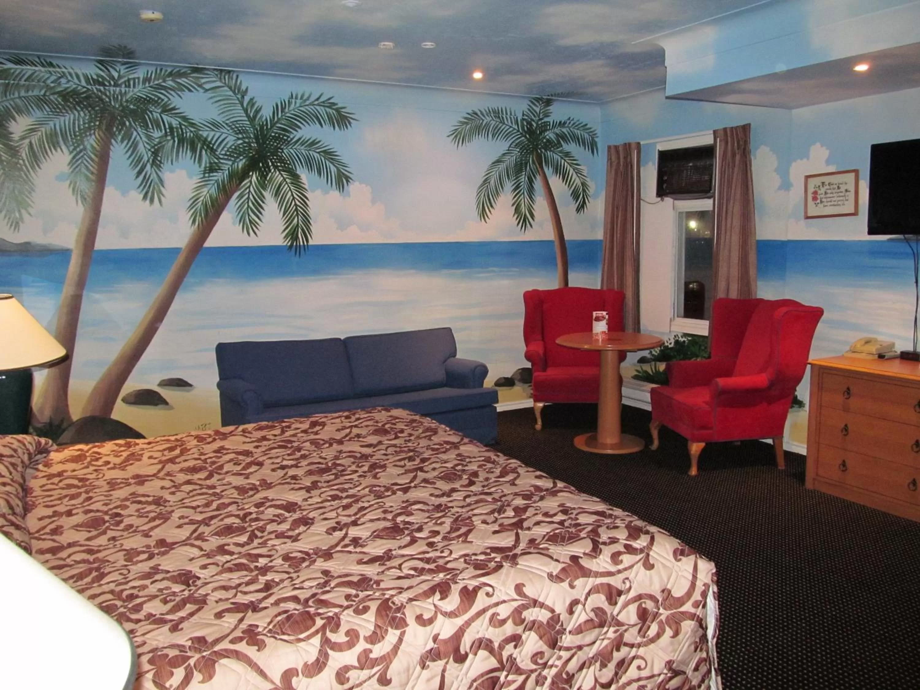 Photo of the whole room, Bed in Knights Inn London Ontario