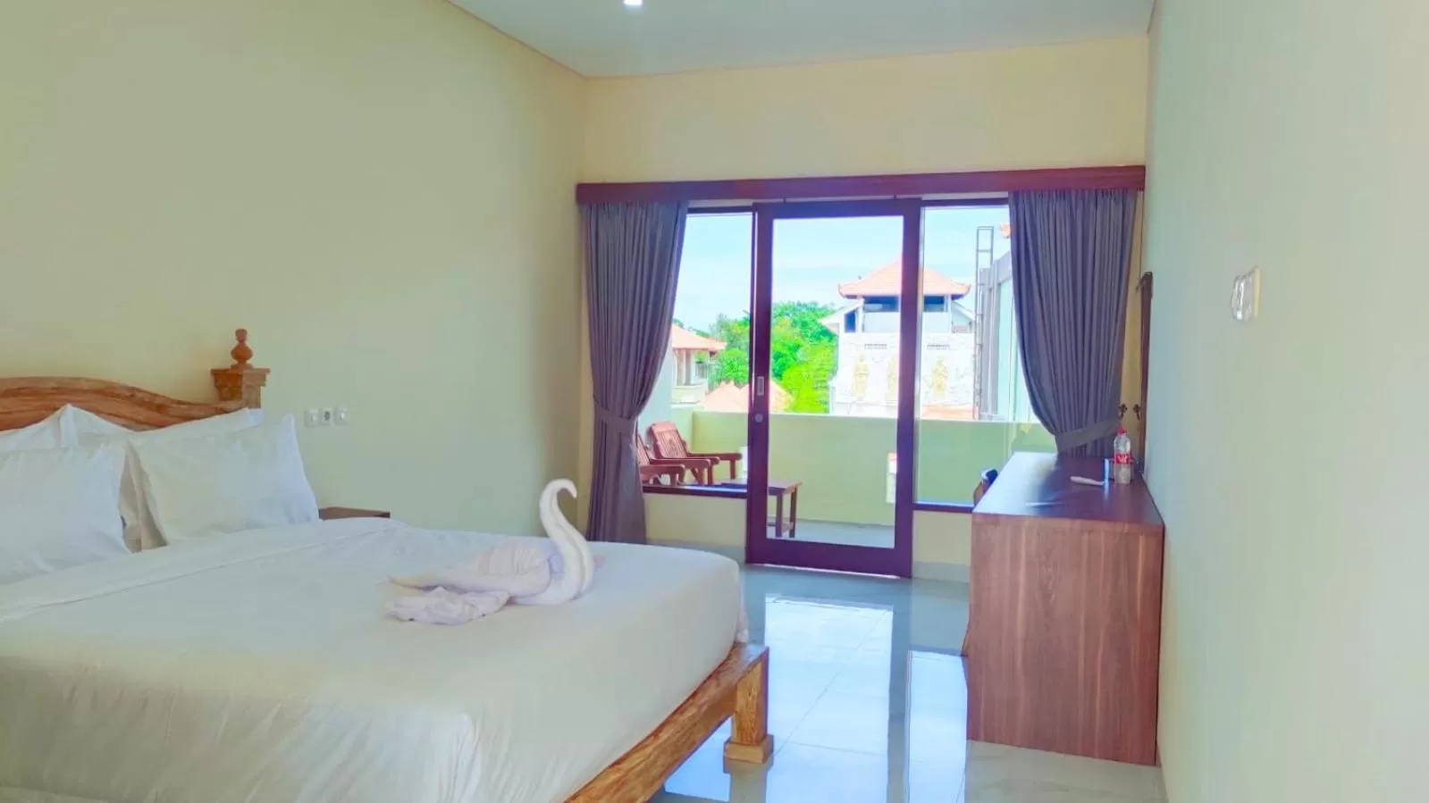 Bed in THE LAVIANA HOTEL