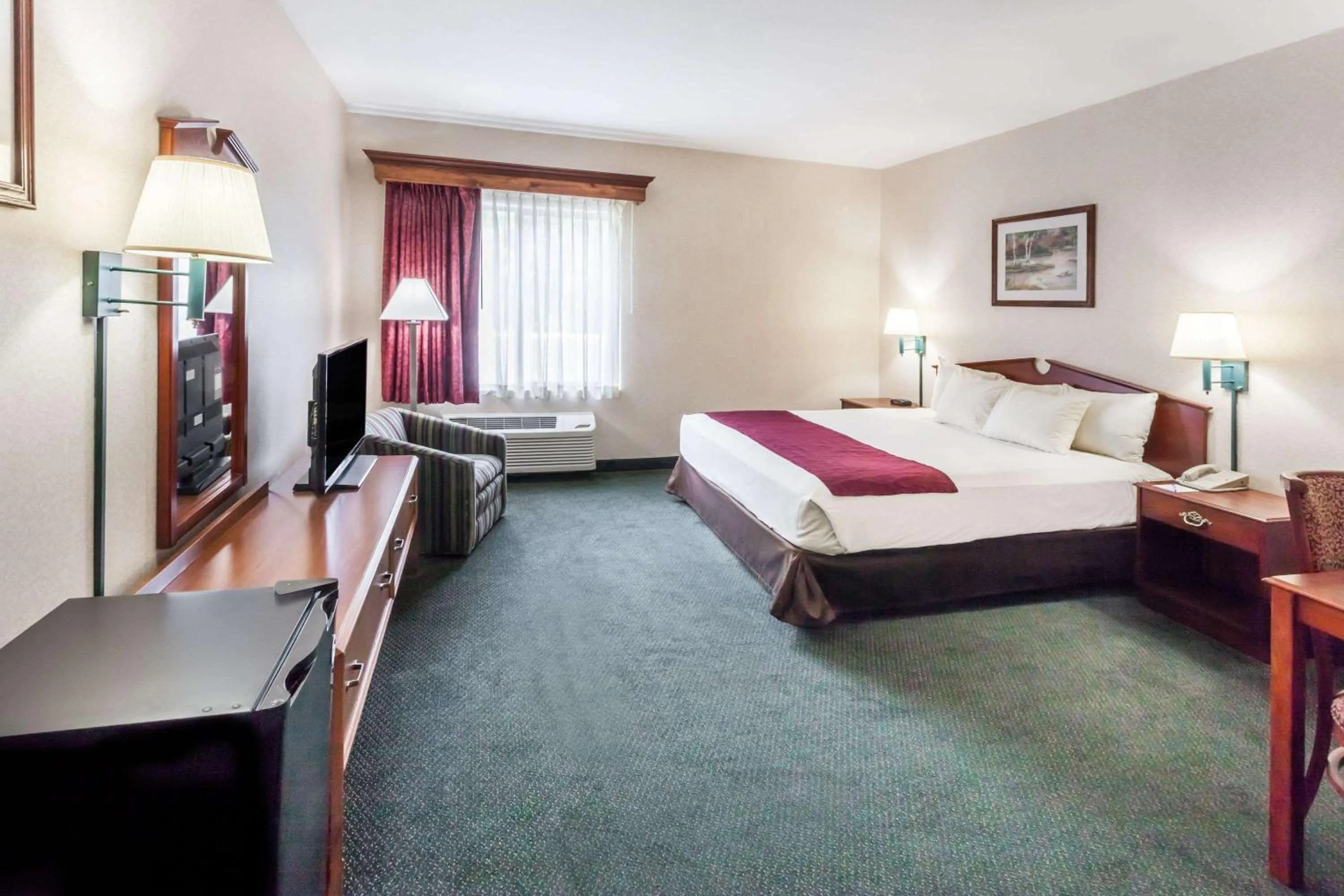 Photo of the whole room, Bed in Baymont by Wyndham New Buffalo