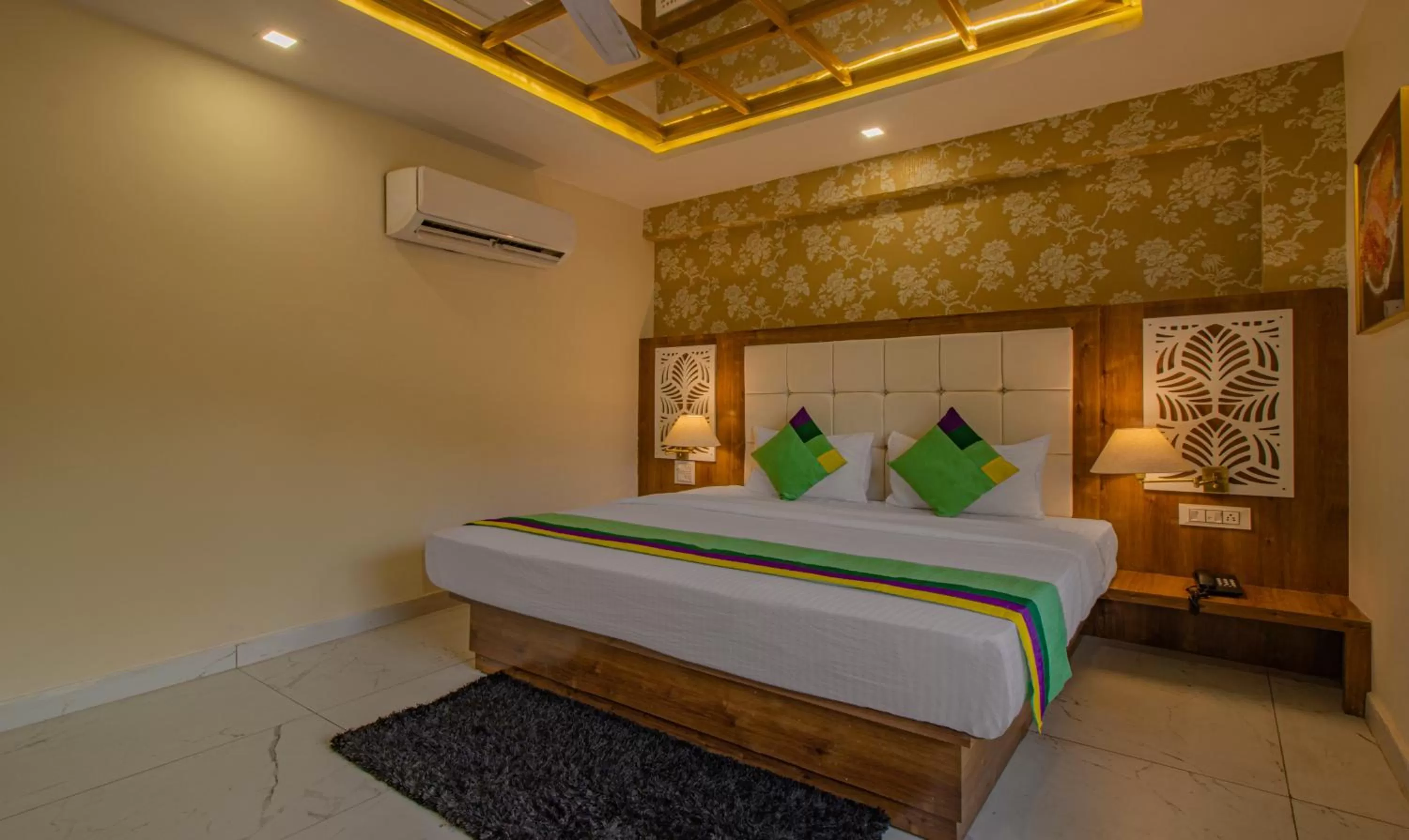 Bed in Treebo Trend Haveli Resort Roots Bhupatwala