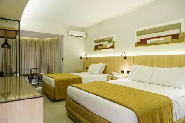 Bed in Rafain Palace Hotel & Convention Center