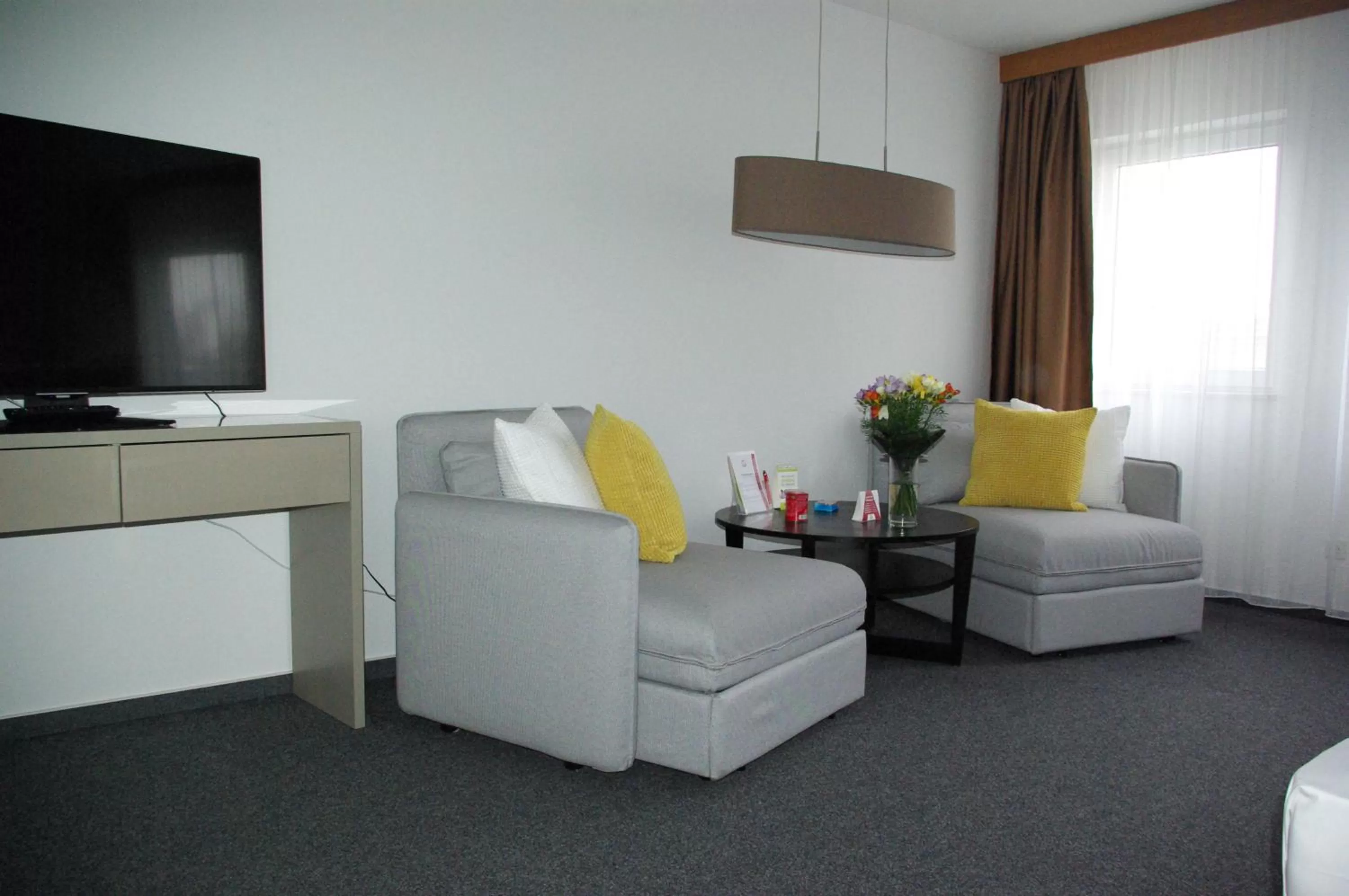 Photo of the whole room in astral'Inn Leipzig Hotel & Restaurant