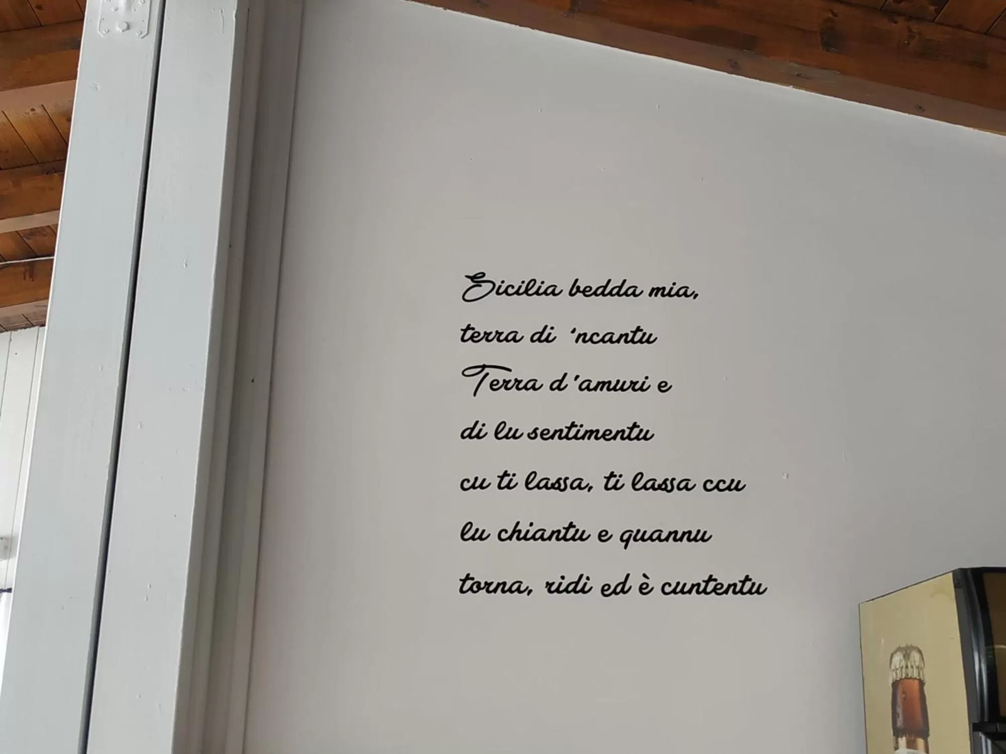 Text overlay in Case Vacanze Ancora