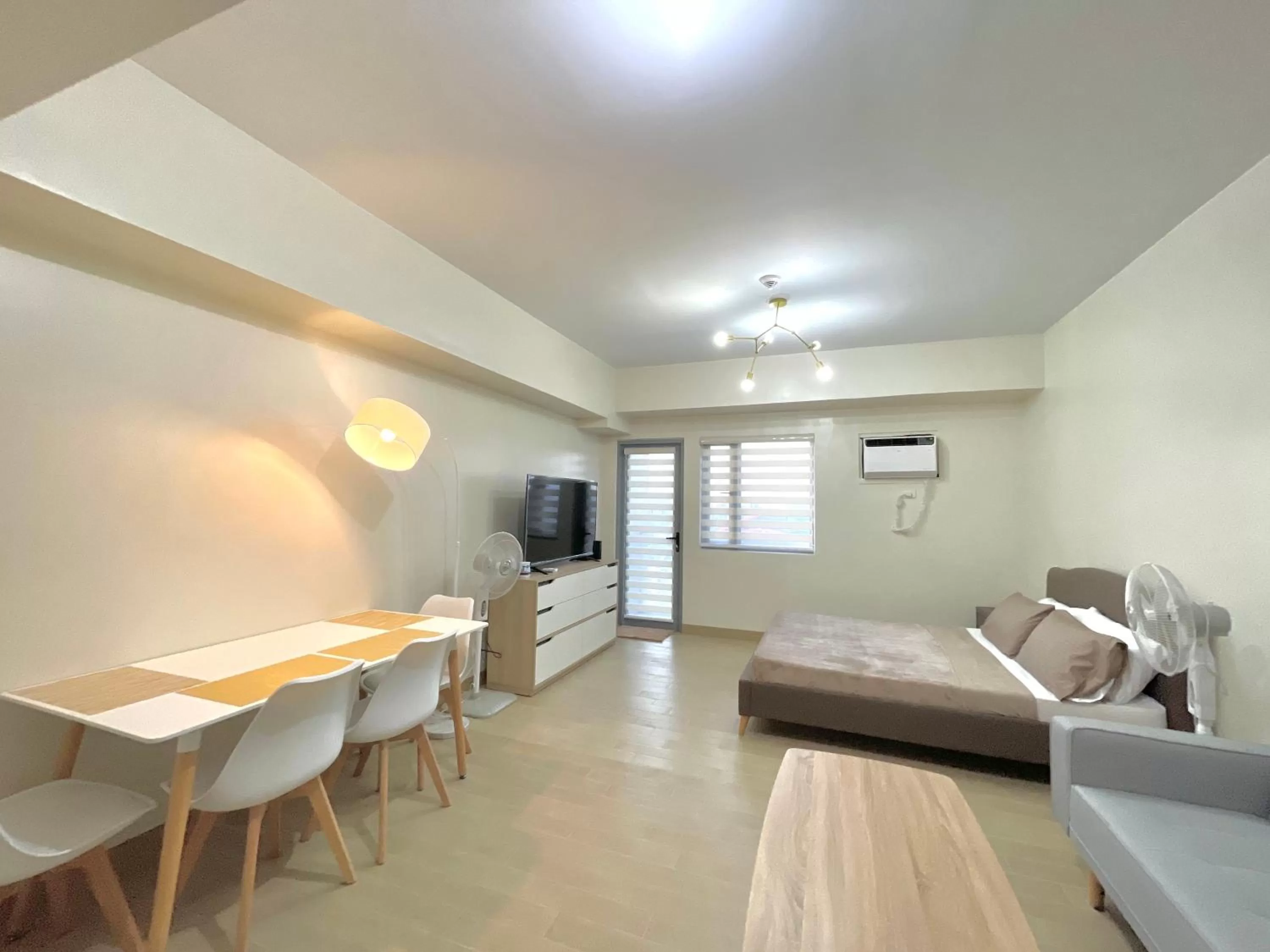 Bed, Seating Area in Cubao, Quezon City Condo Staycation (wifi and netflix ready)