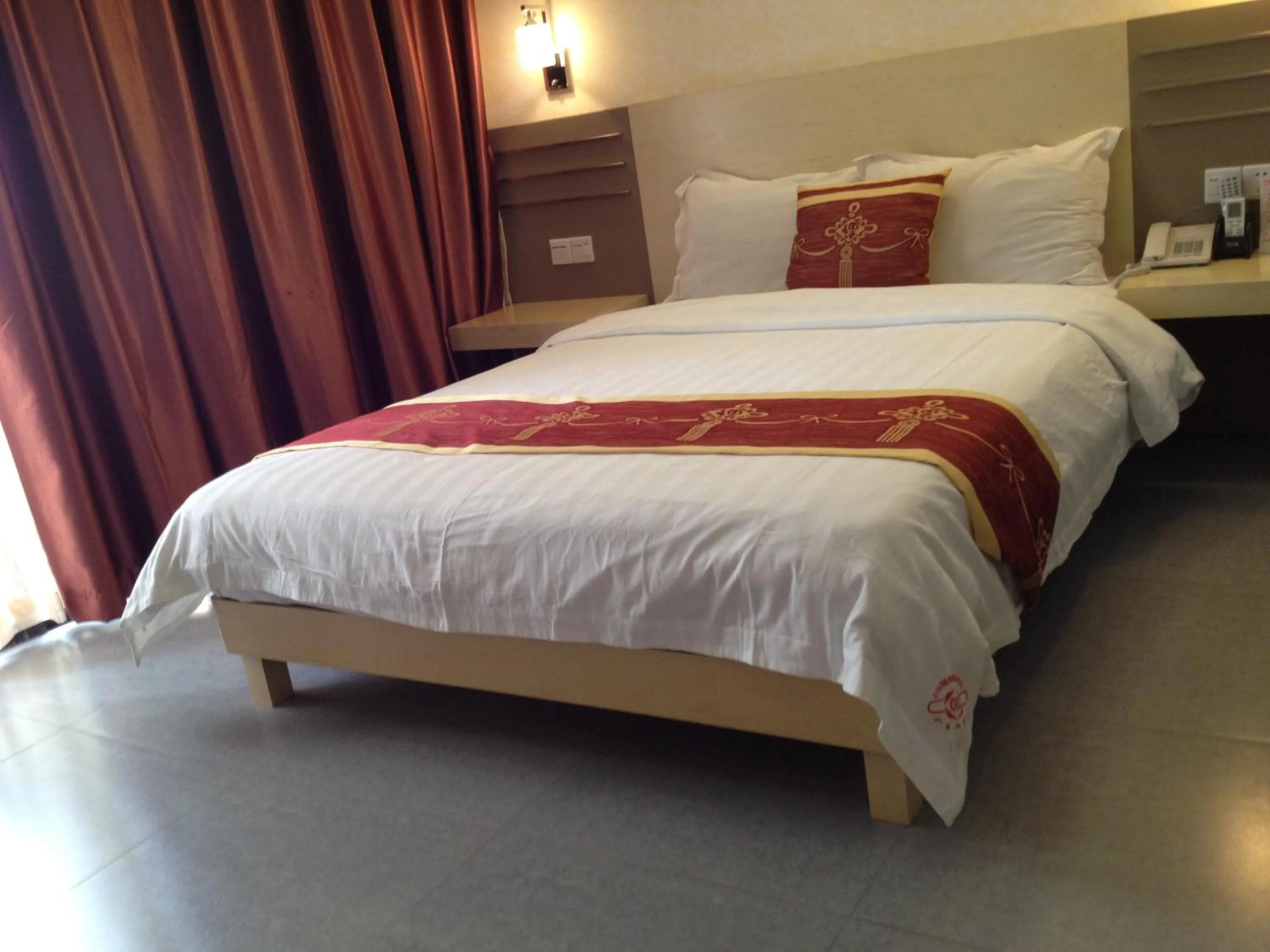 Bed in Guang Dong Hotel
