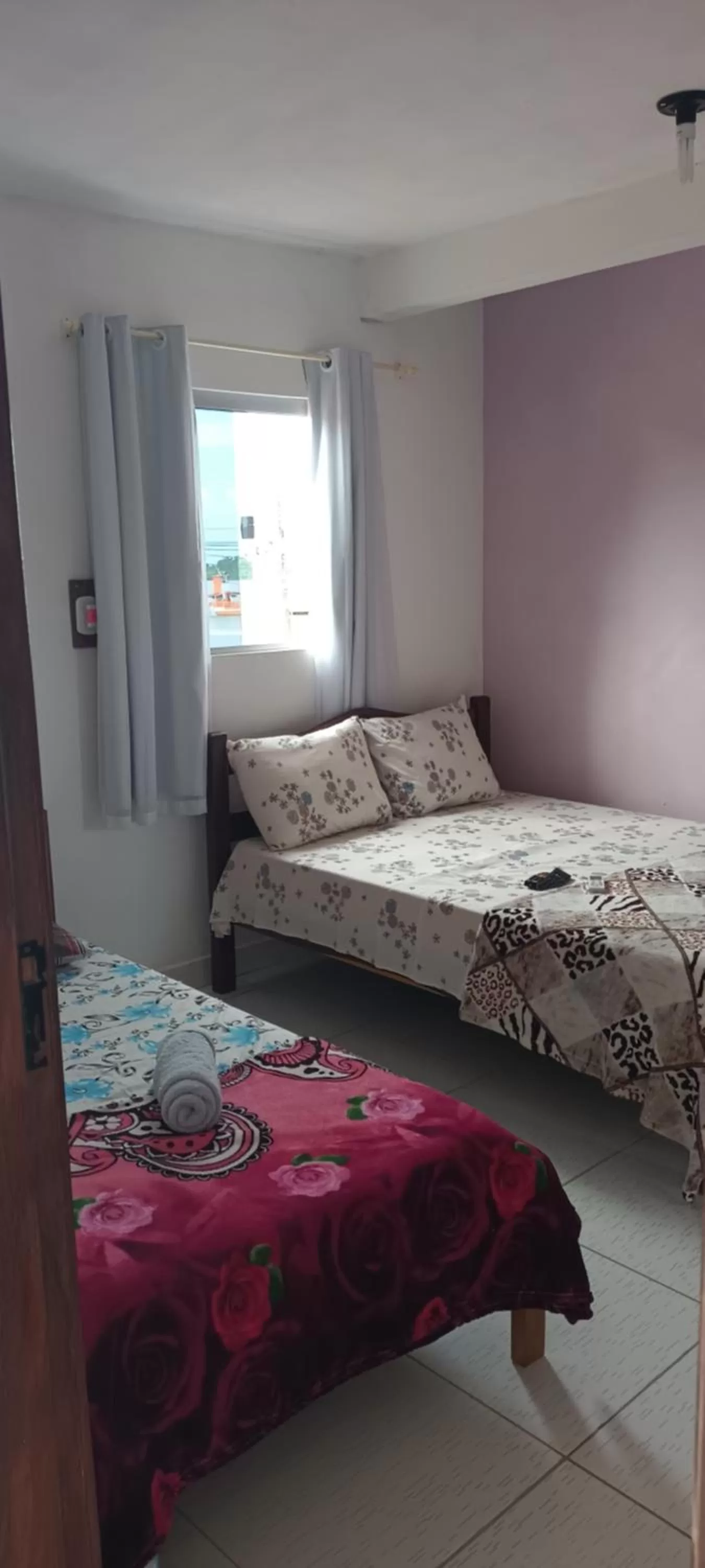 Bed in Pousada dos Ventos