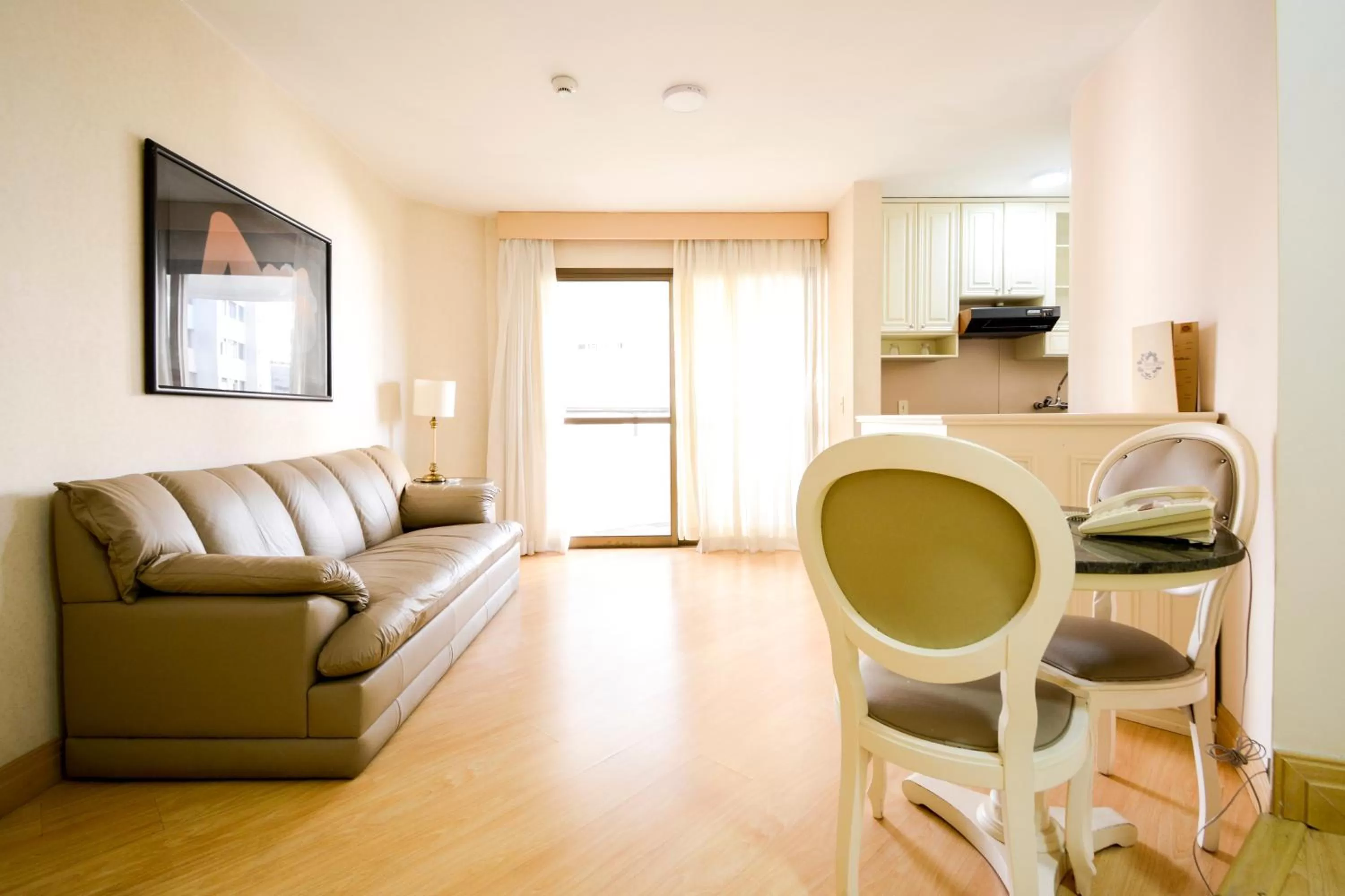 Living room, Seating Area in Wall Street Apartments by BnbHost