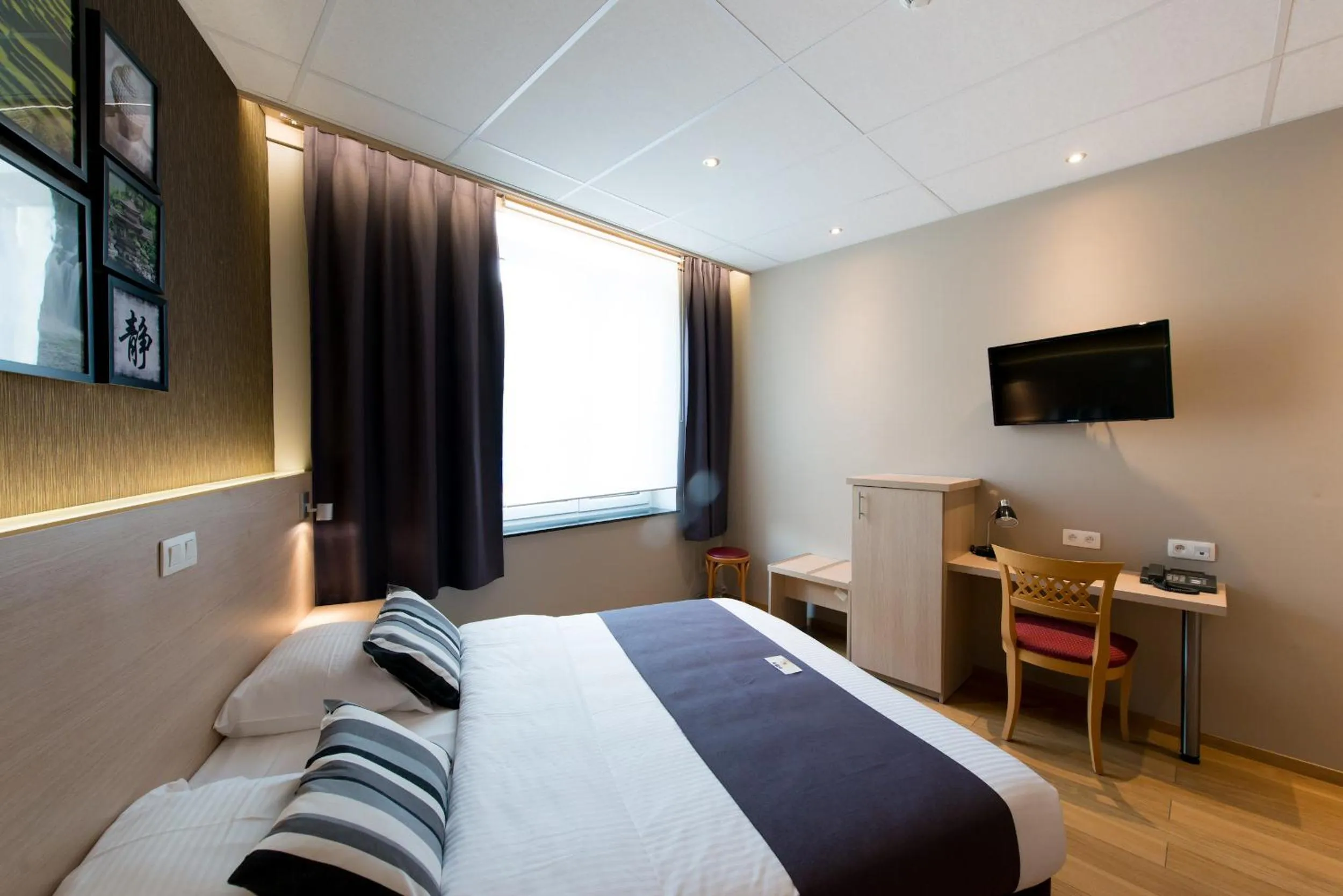 Bed in Univers Hotel Liege-Guillemins