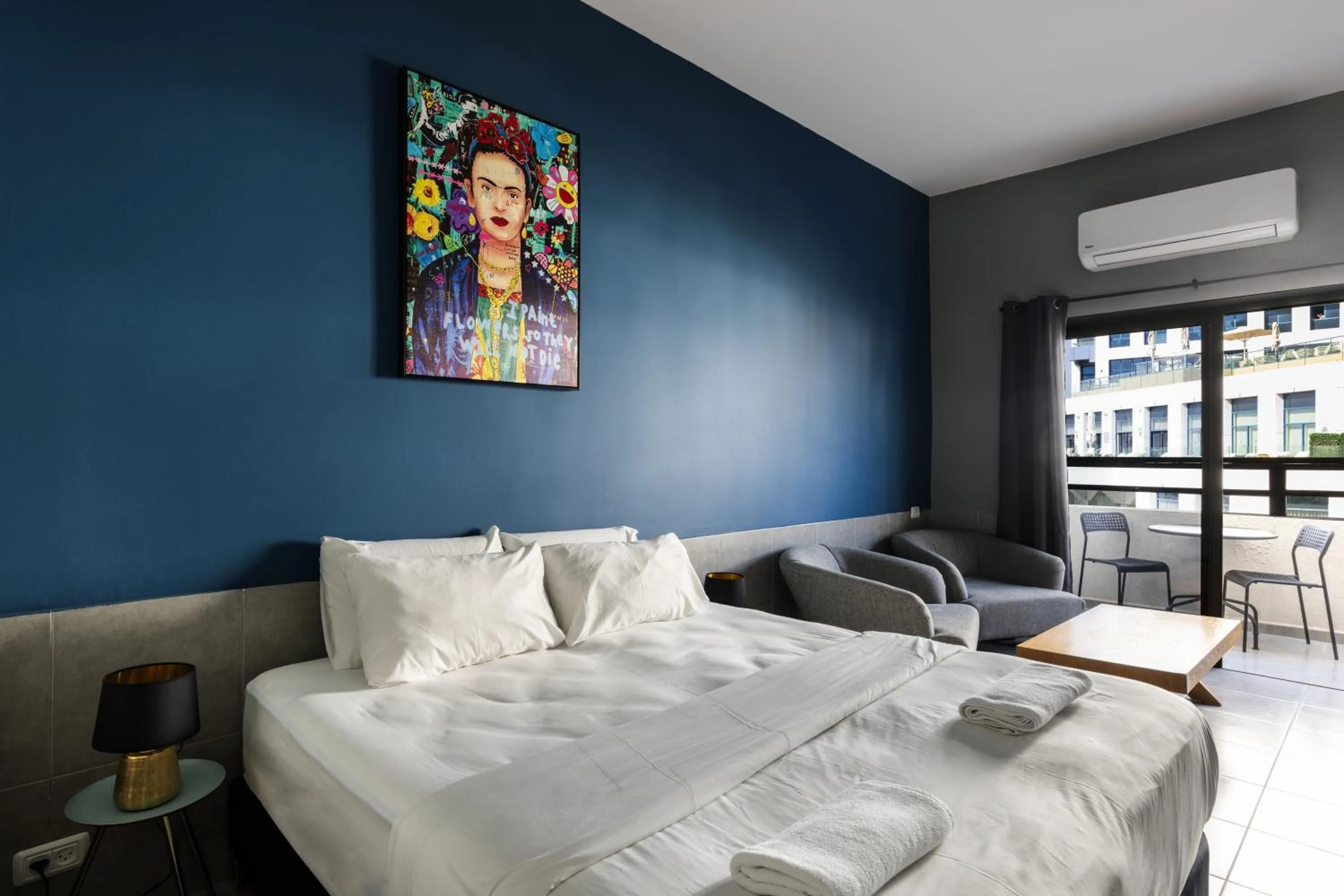 Photo of the whole room, Bed in Liber Tel Aviv Sea Shore Suites BY RAPHAEL HOTELS