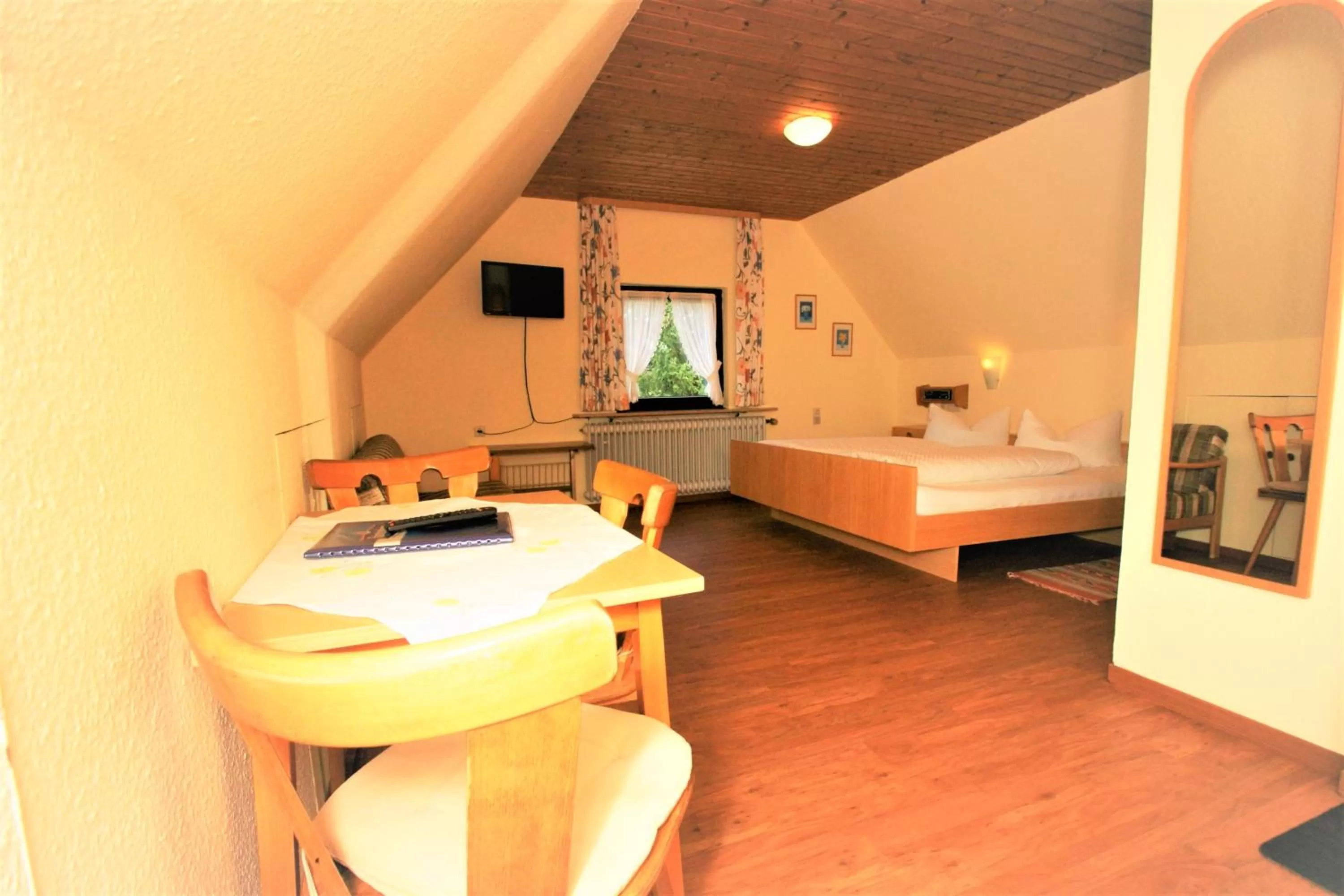 Photo of the whole room, Bed in ZUR TRAUBE Schwarzwaldhotel & Restaurant am Titisee