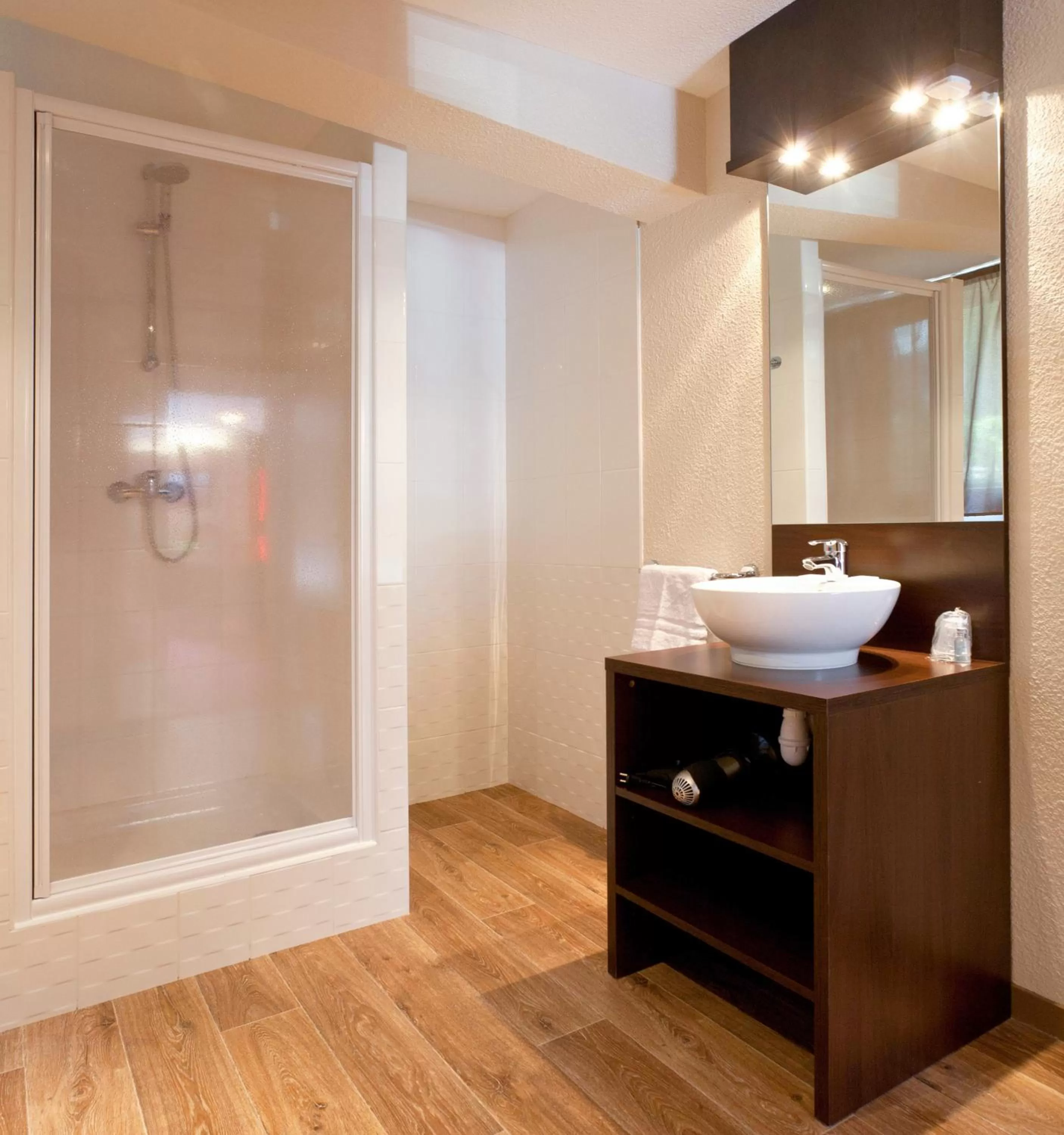 Bathroom in SOWELL HOTELS Mont Blanc et SPA