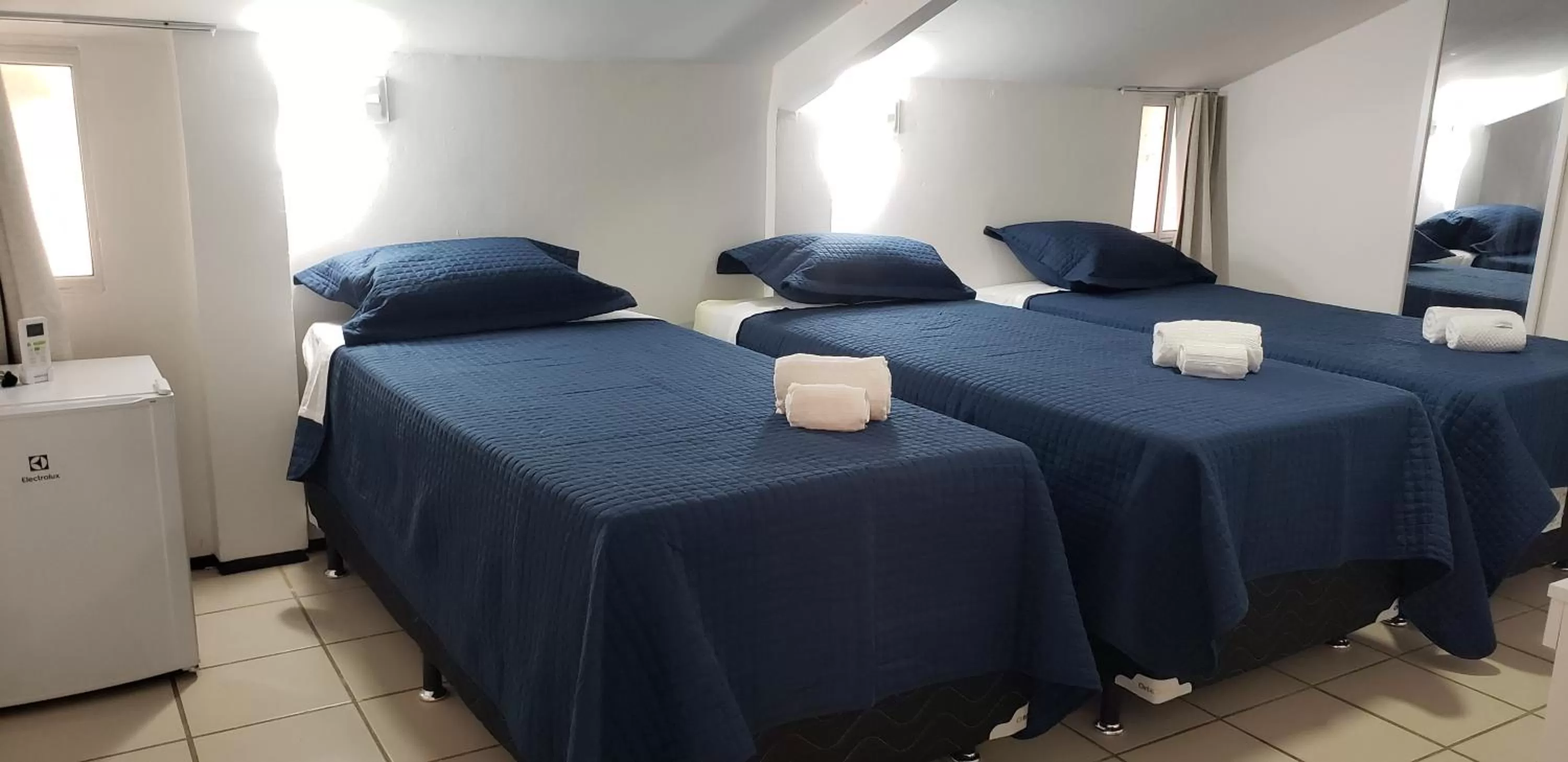 Bed in LIVE IN FORTALEZA HOTEL