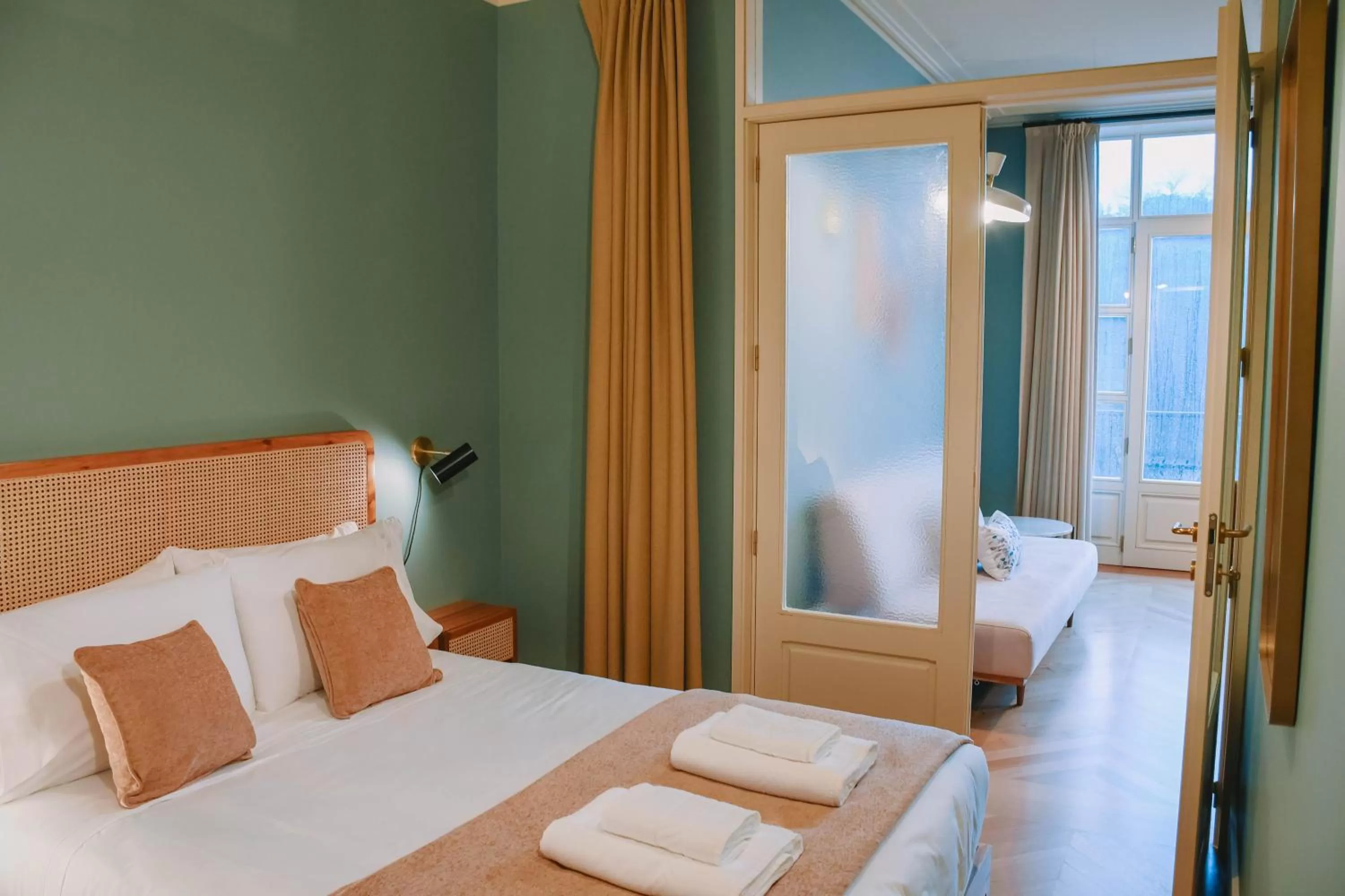 Bed in Villa Theatro Heritage Apartments