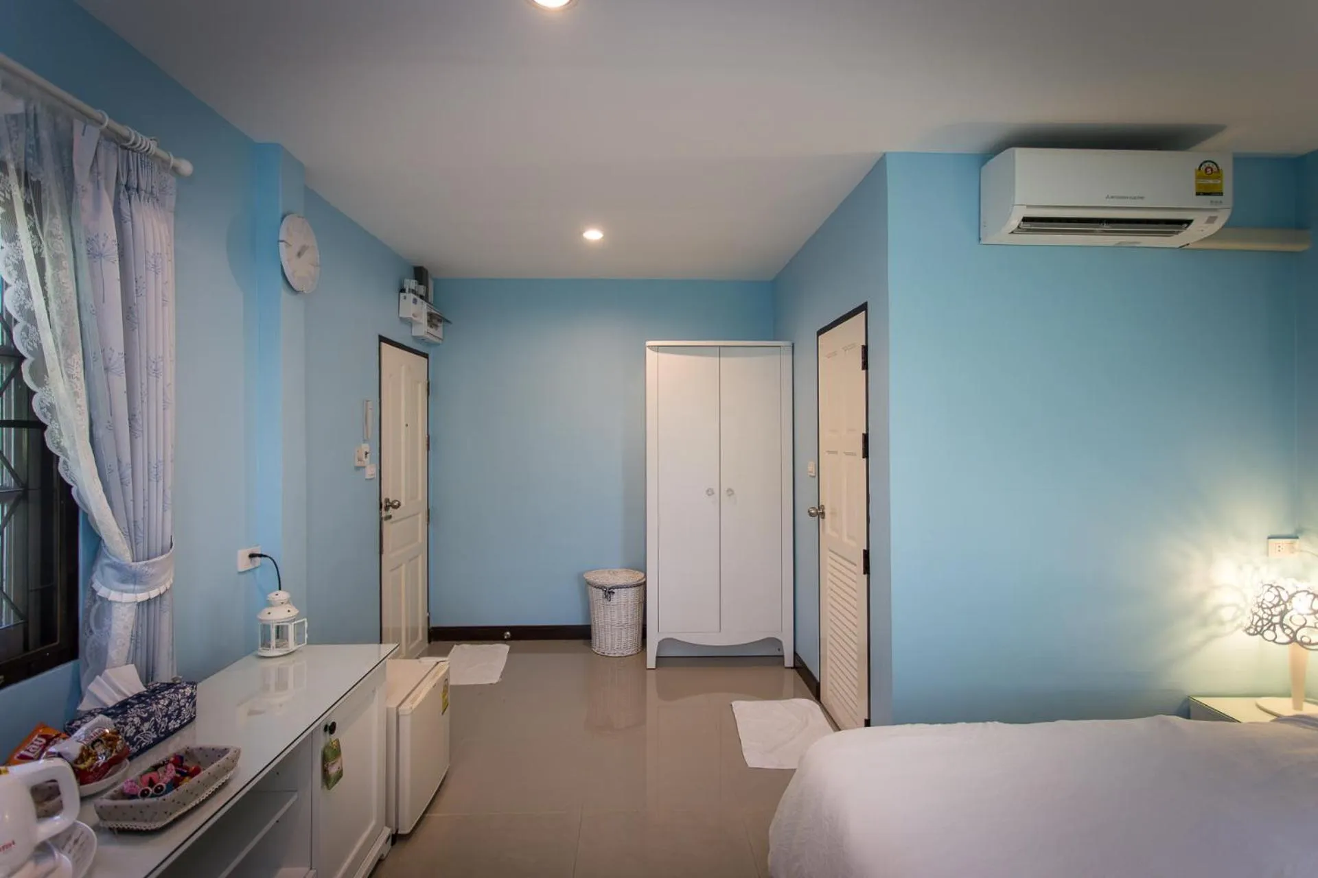 Bed in Thararin Villa