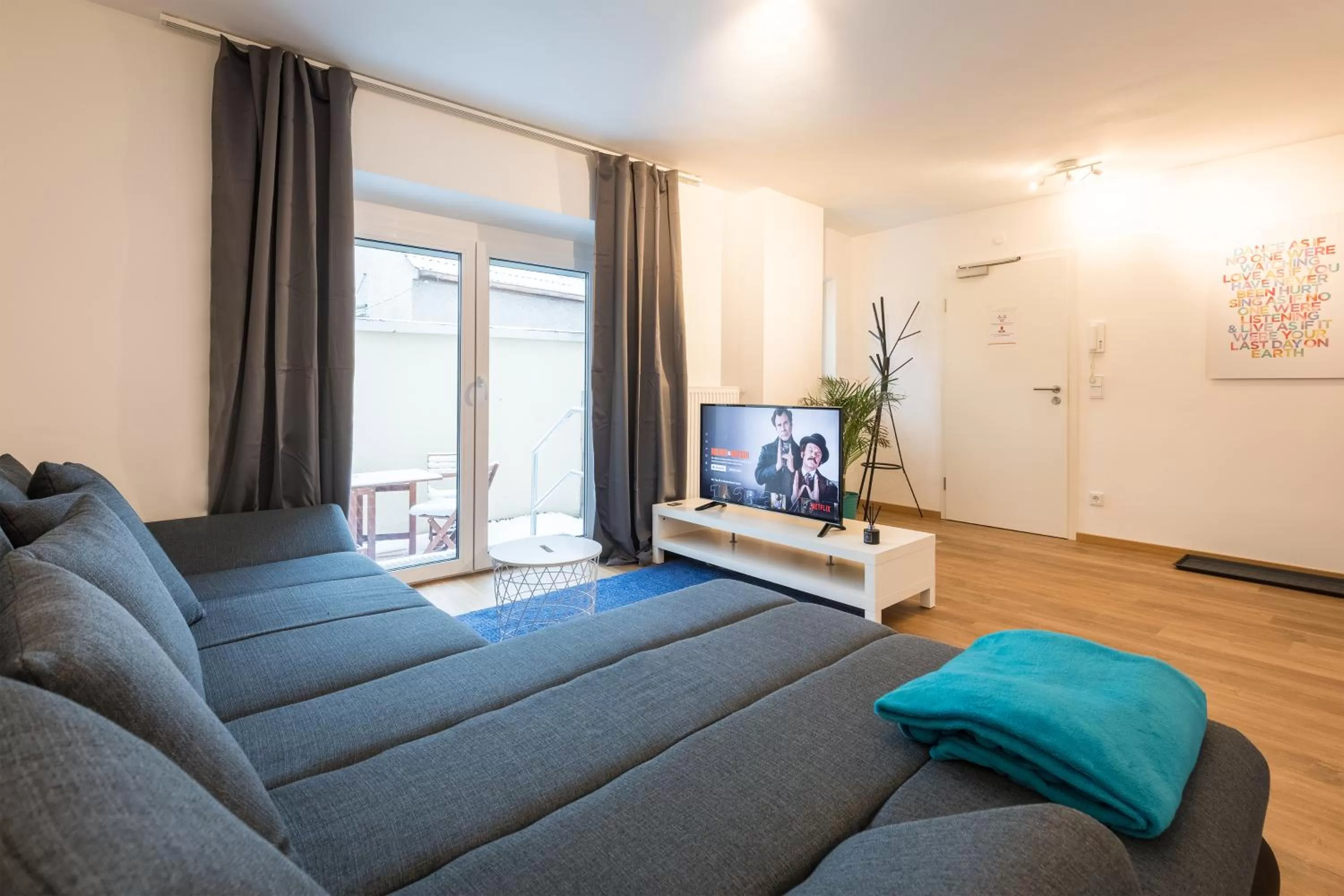 Communal lounge/ TV room in Arbio I Cozy Apartments Augsburg-Lechhausen