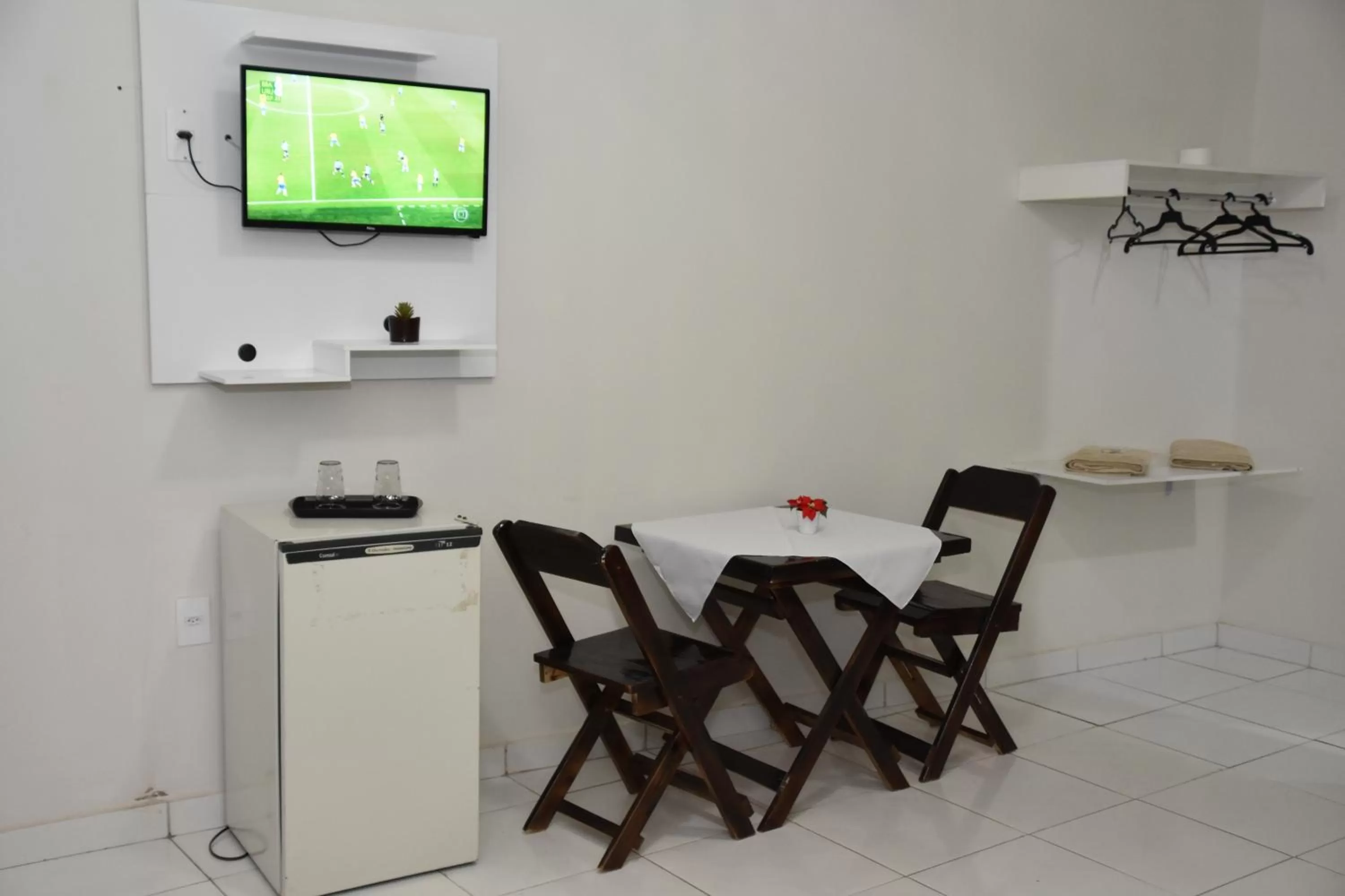 Bed in Pousada e Posto Amigão