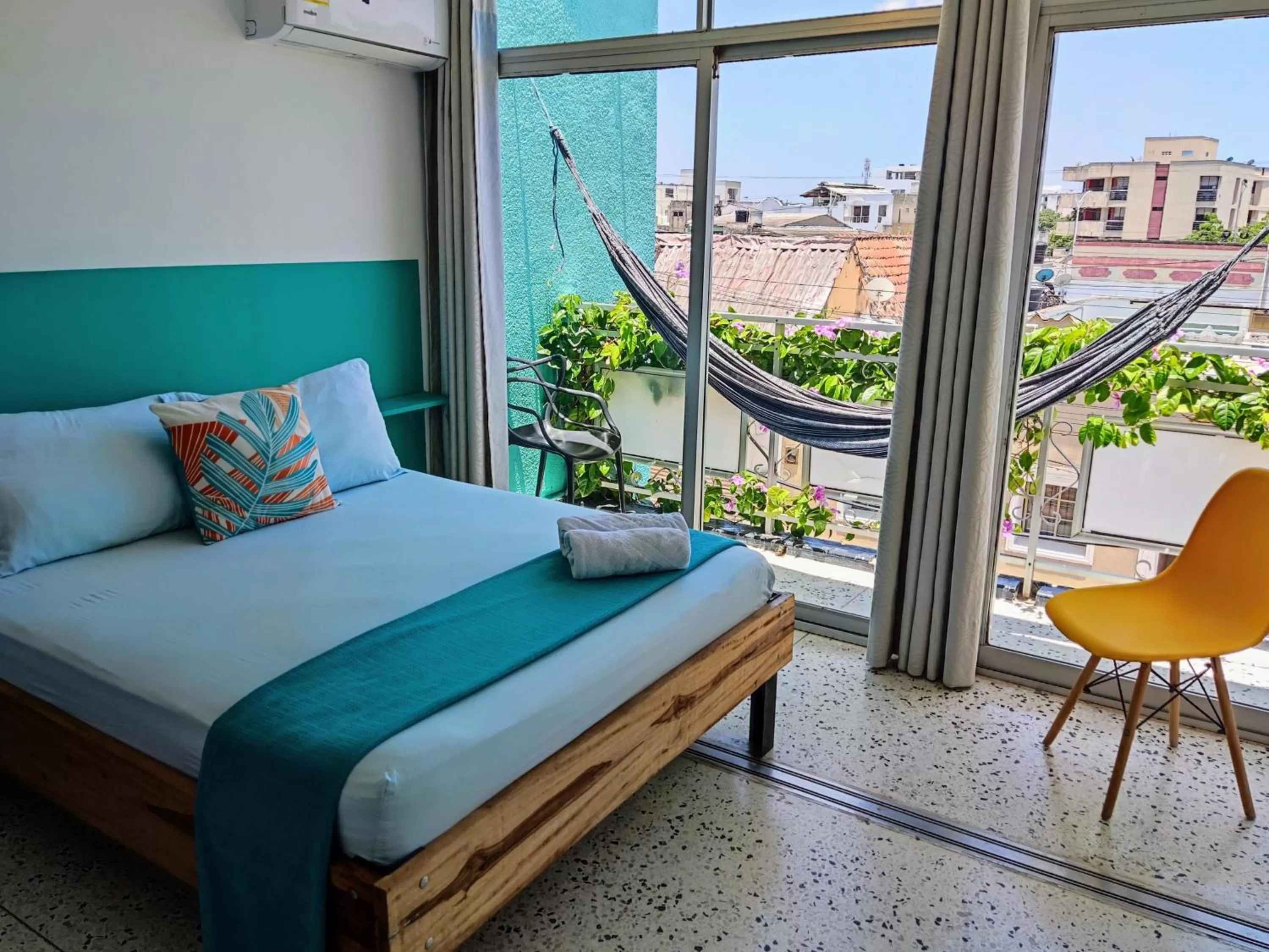 Bed in Bona Vida Hotel