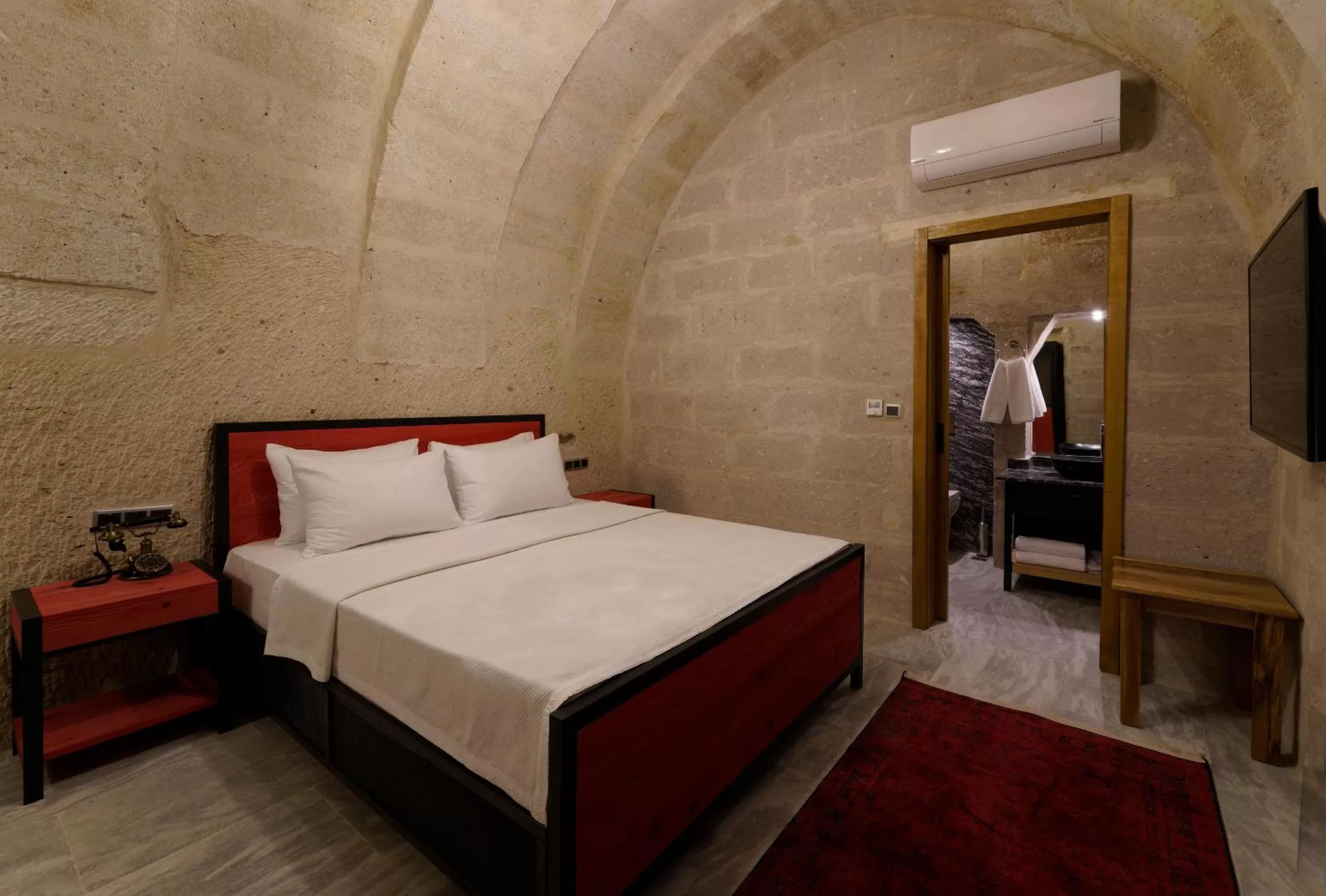 Bed in The Niche Cave Hotel