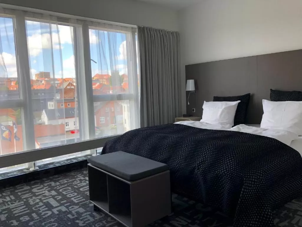 Bed in Hotel Skivehus