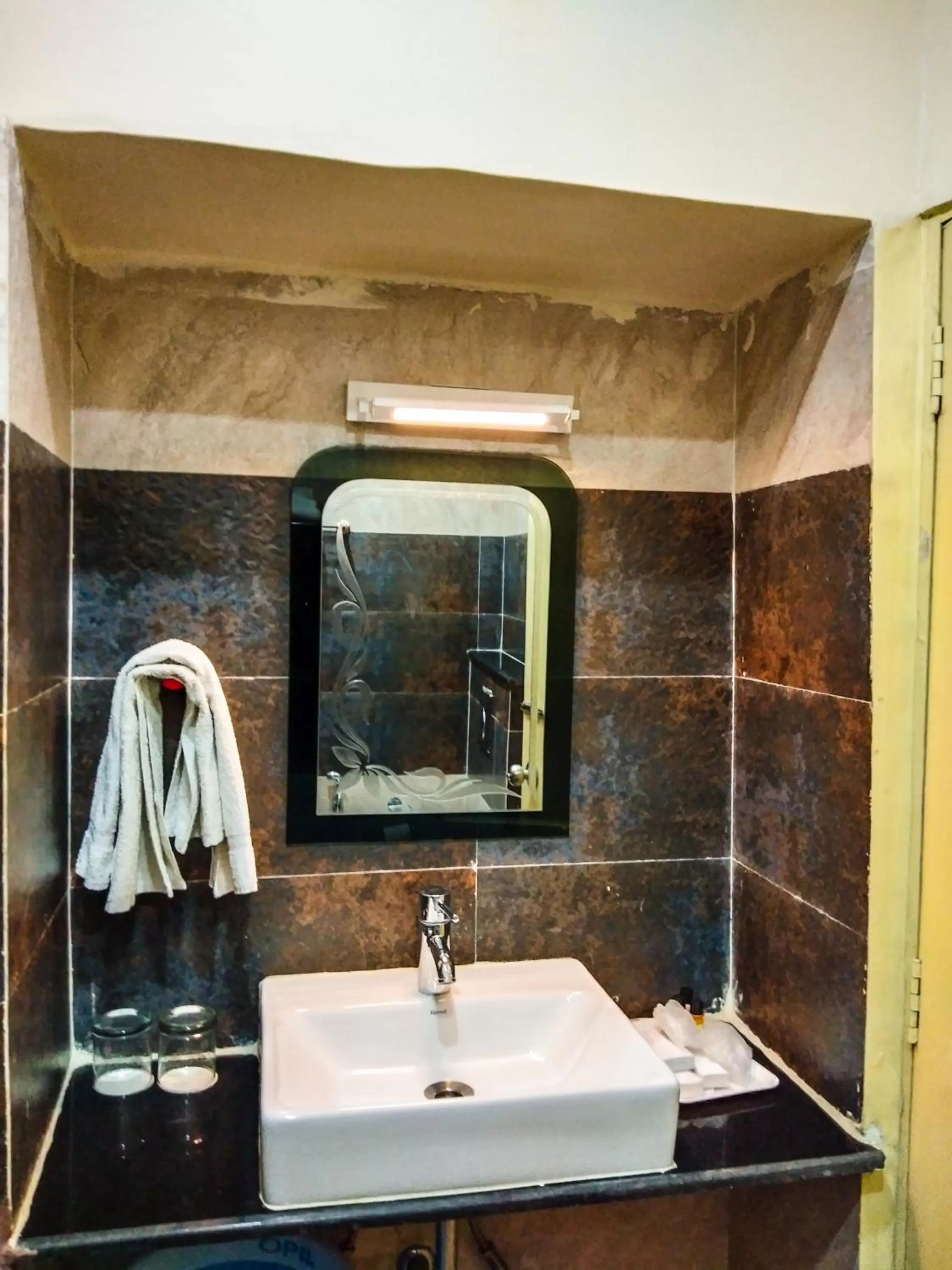 Bathroom in Dwivedi Hotels Sri Omkar Palace
