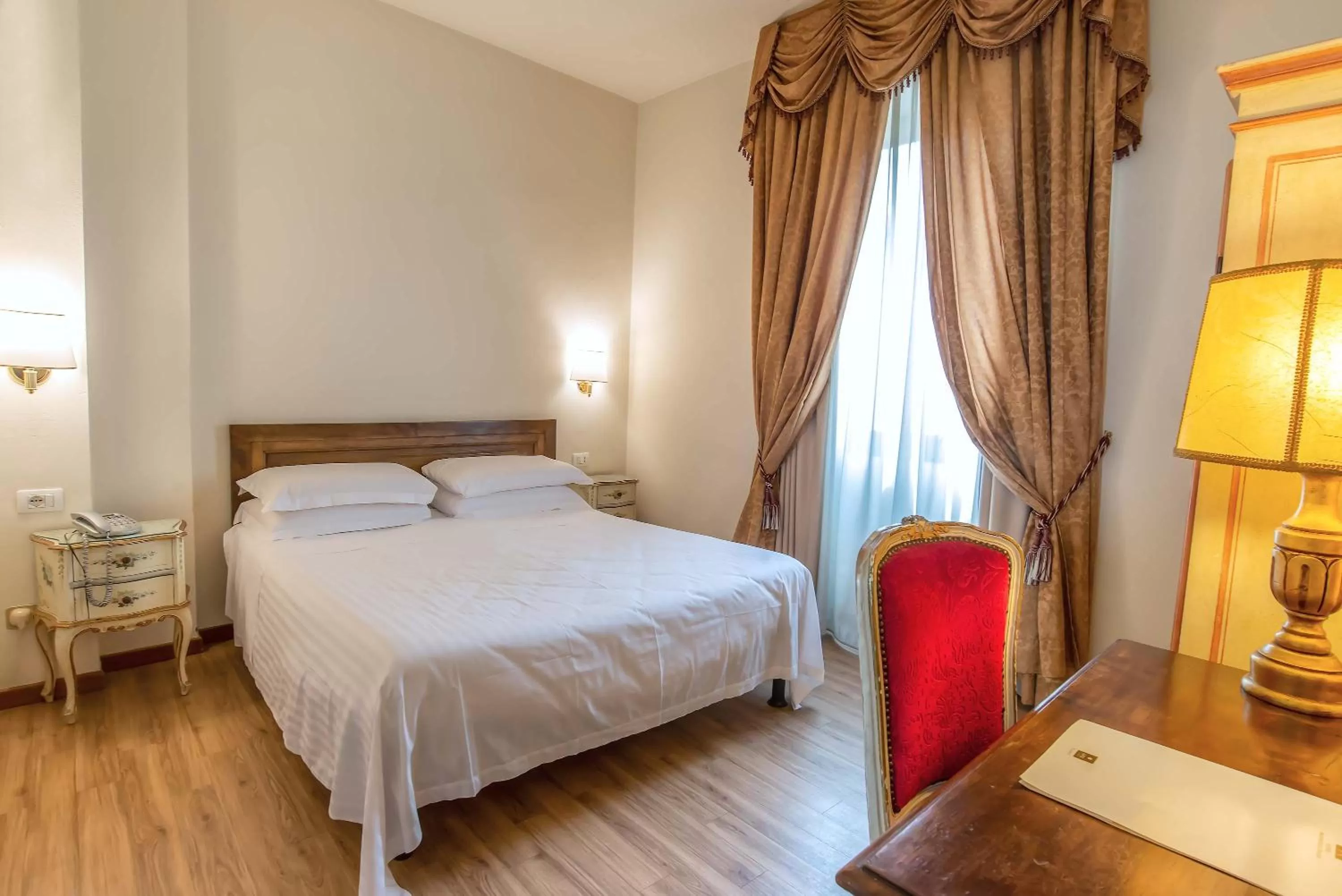 Bed in Hotel Machiavelli Palace