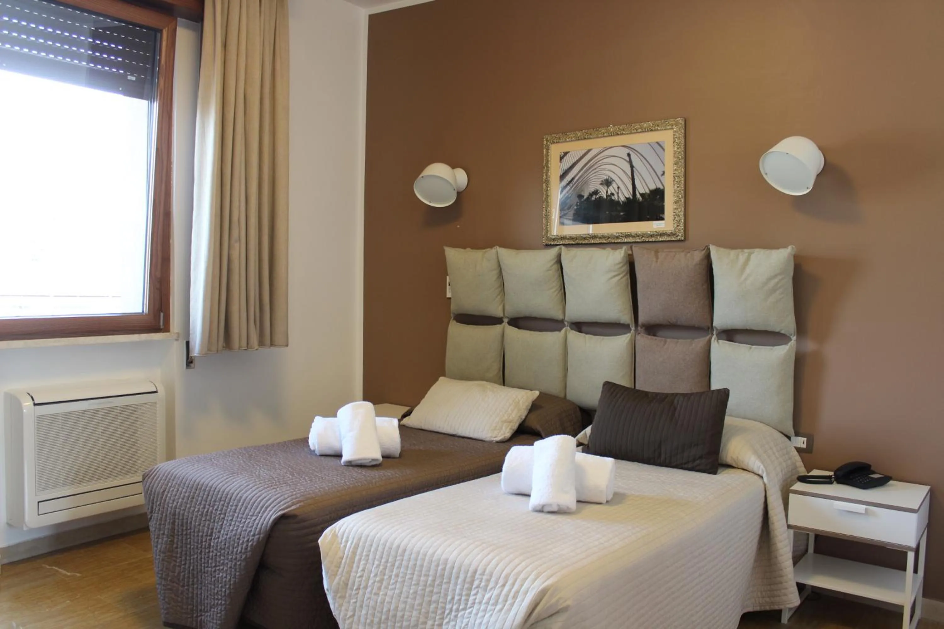 Bed in Hotel Franchi