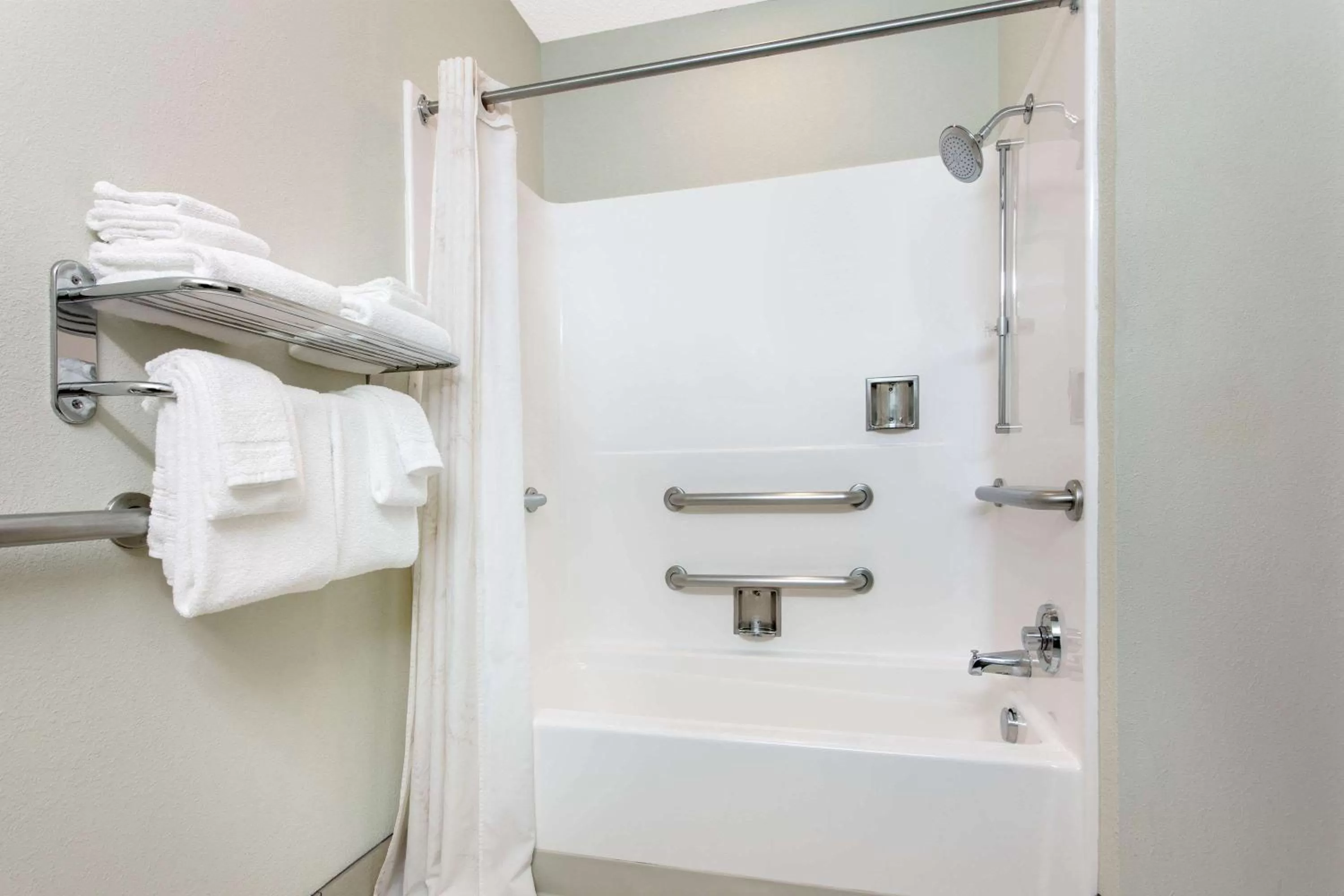 Bathroom in Microtel Inn & Suites by Wyndham Lillington/Campbell University