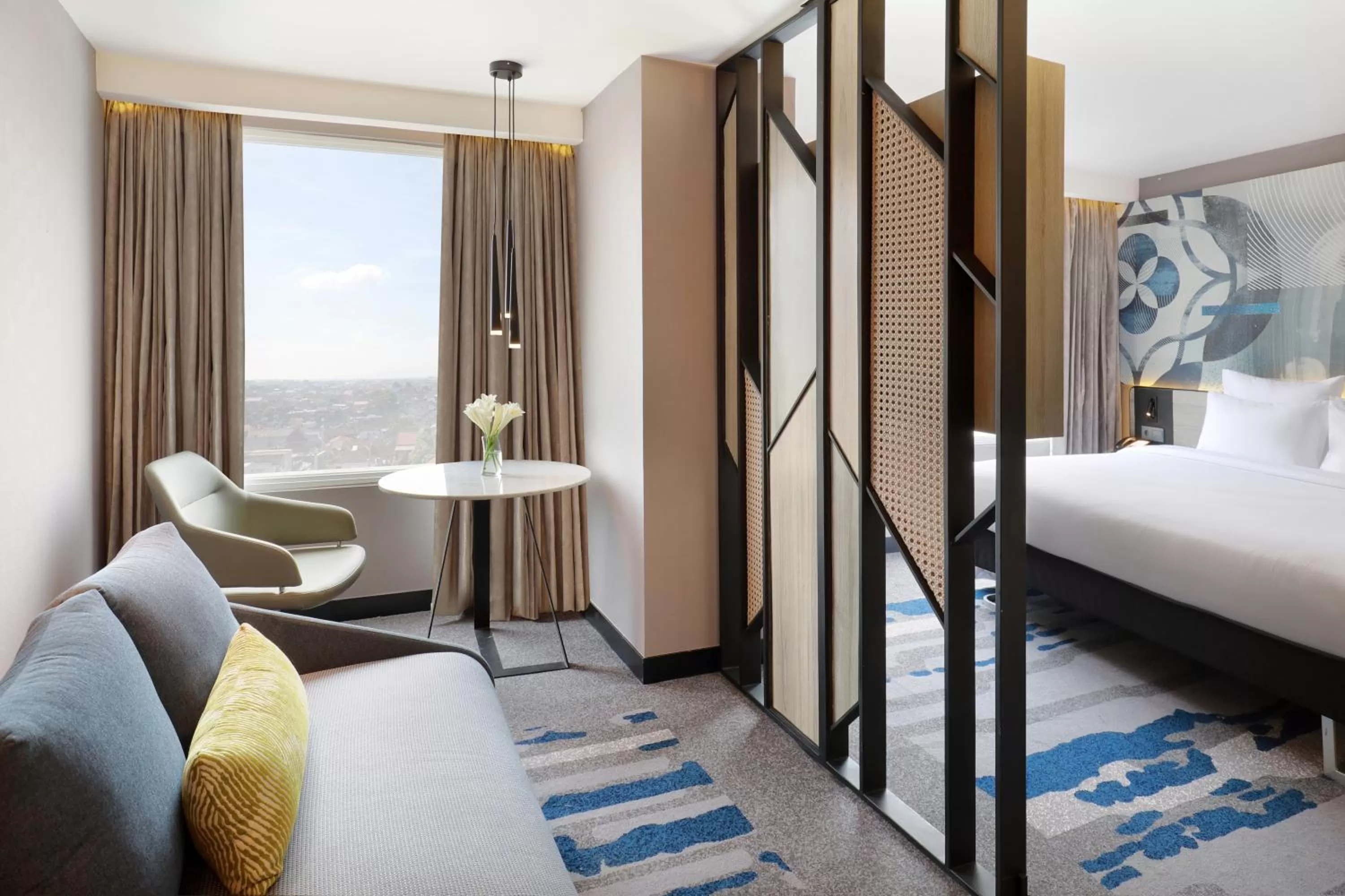 Bed in Novotel Suites Yogyakarta Malioboro