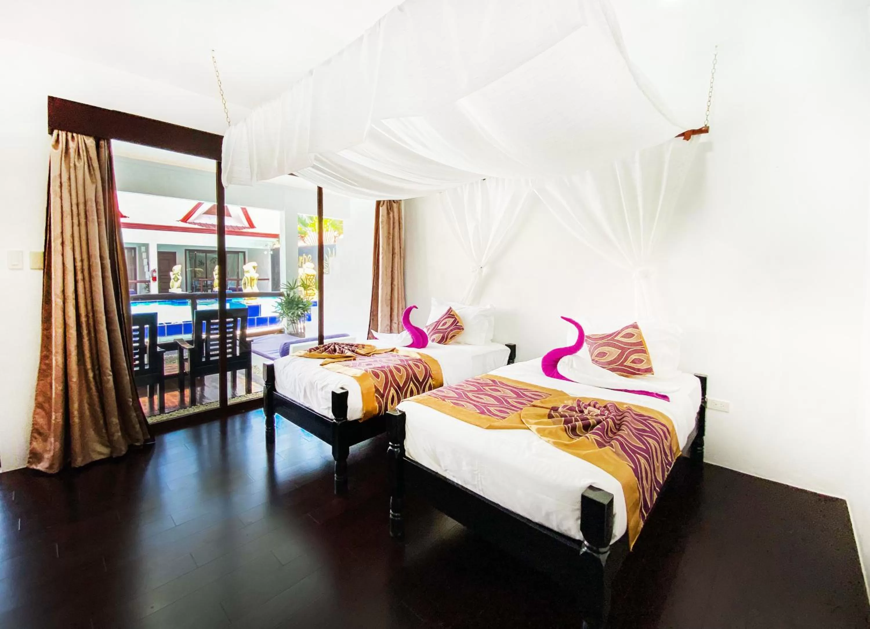 Bed in Carpe Diem Villas & Resort Dive & Stay resort