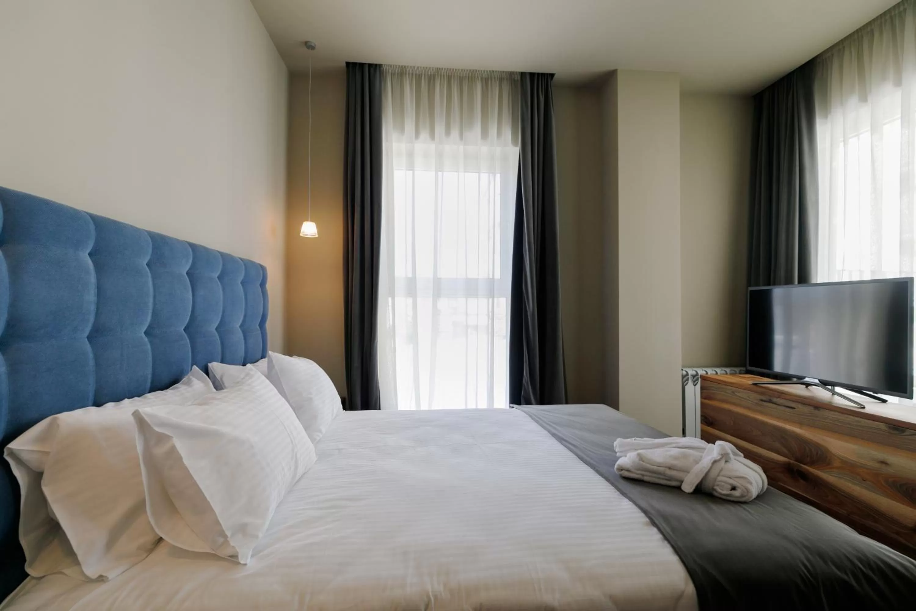 Bed in Il Decameron Luxury Design Hotel