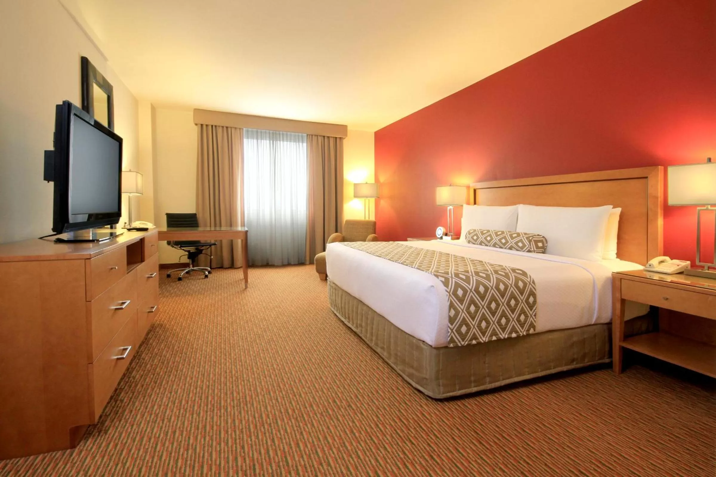 Photo of the whole room, Bed in Crowne Plaza Monterrey Aeropuerto by IHG