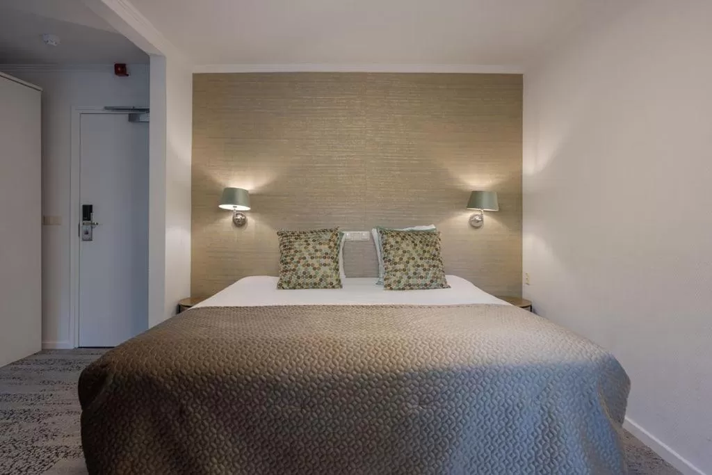 Bed in Boutique Hotel Slenaker Vallei - Buitengewoongenieten