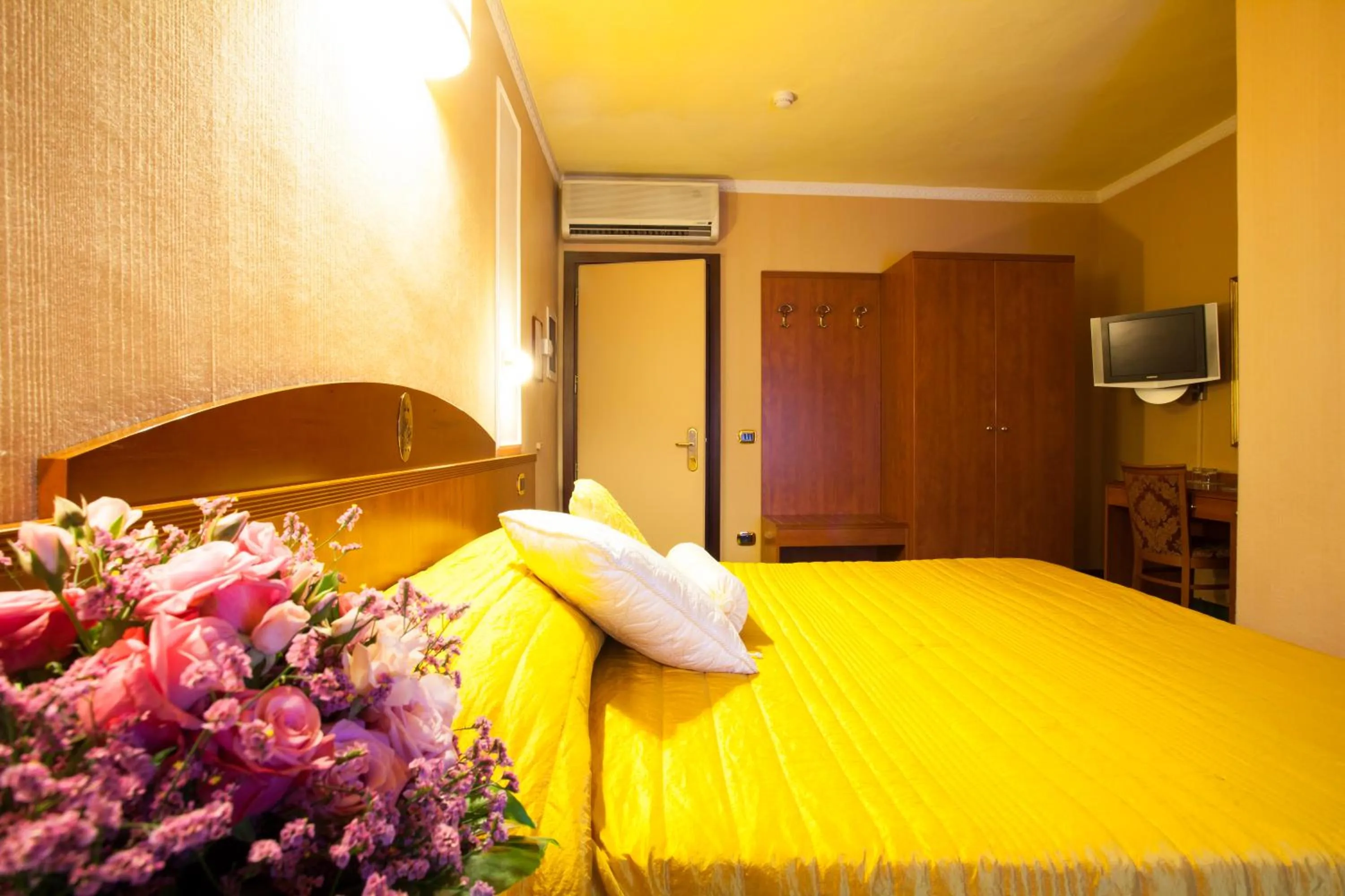 Bed in Boutique Hotel Puccini