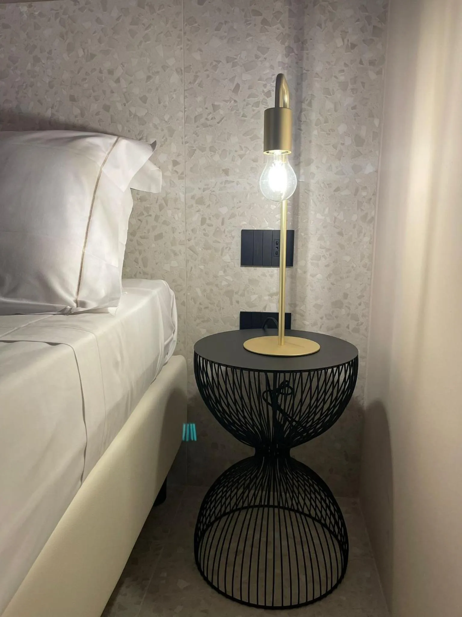 Bed in Elide Design Hotel