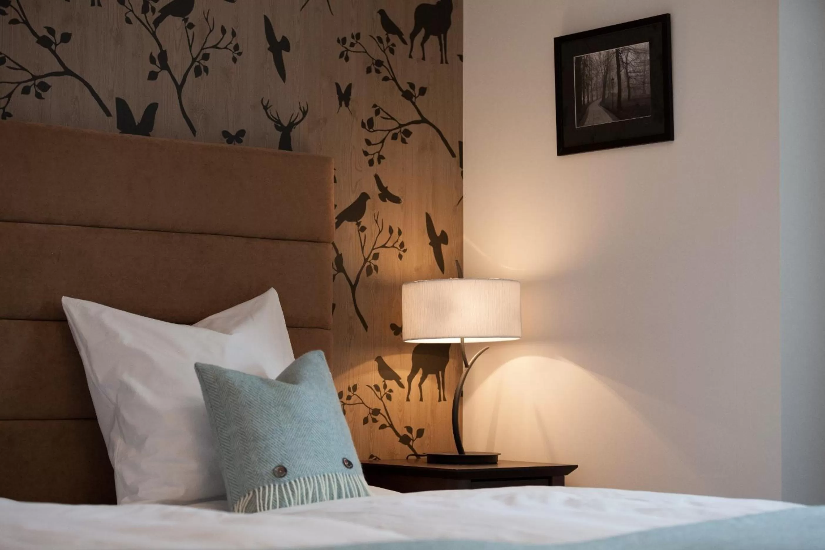 Bed in Boutique-Hotel Garni Bellevue Davos Wiesen