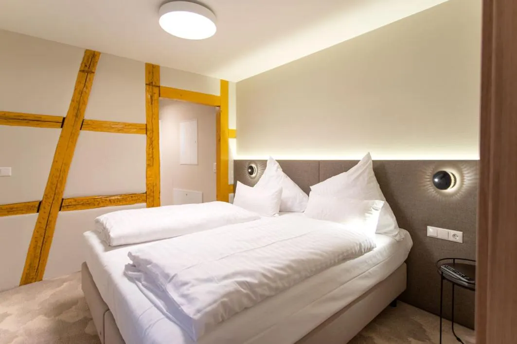 Bedroom, Bed in Hotel Tuchhaus