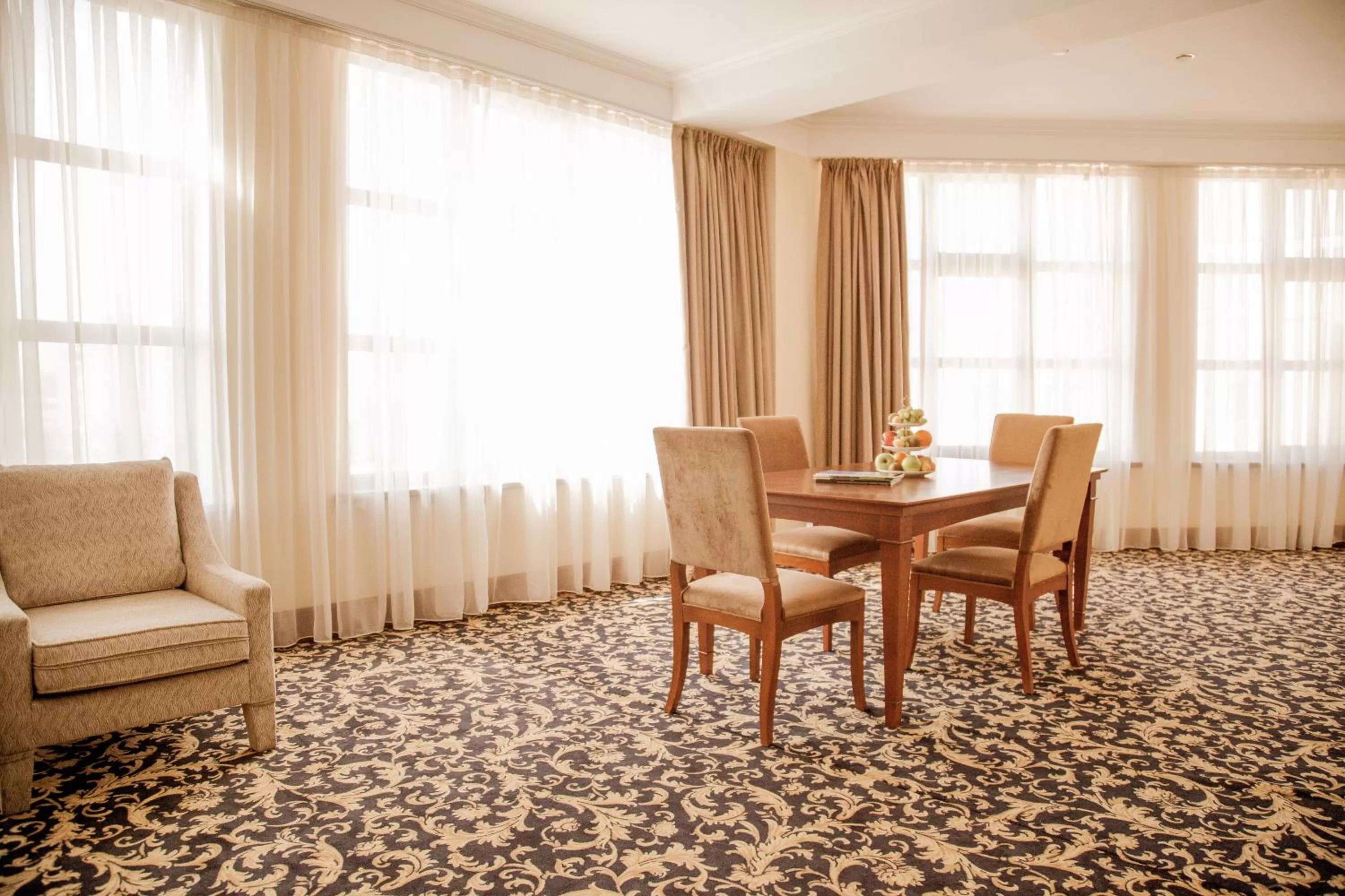 Living room in Ramada by Wyndham Almaty