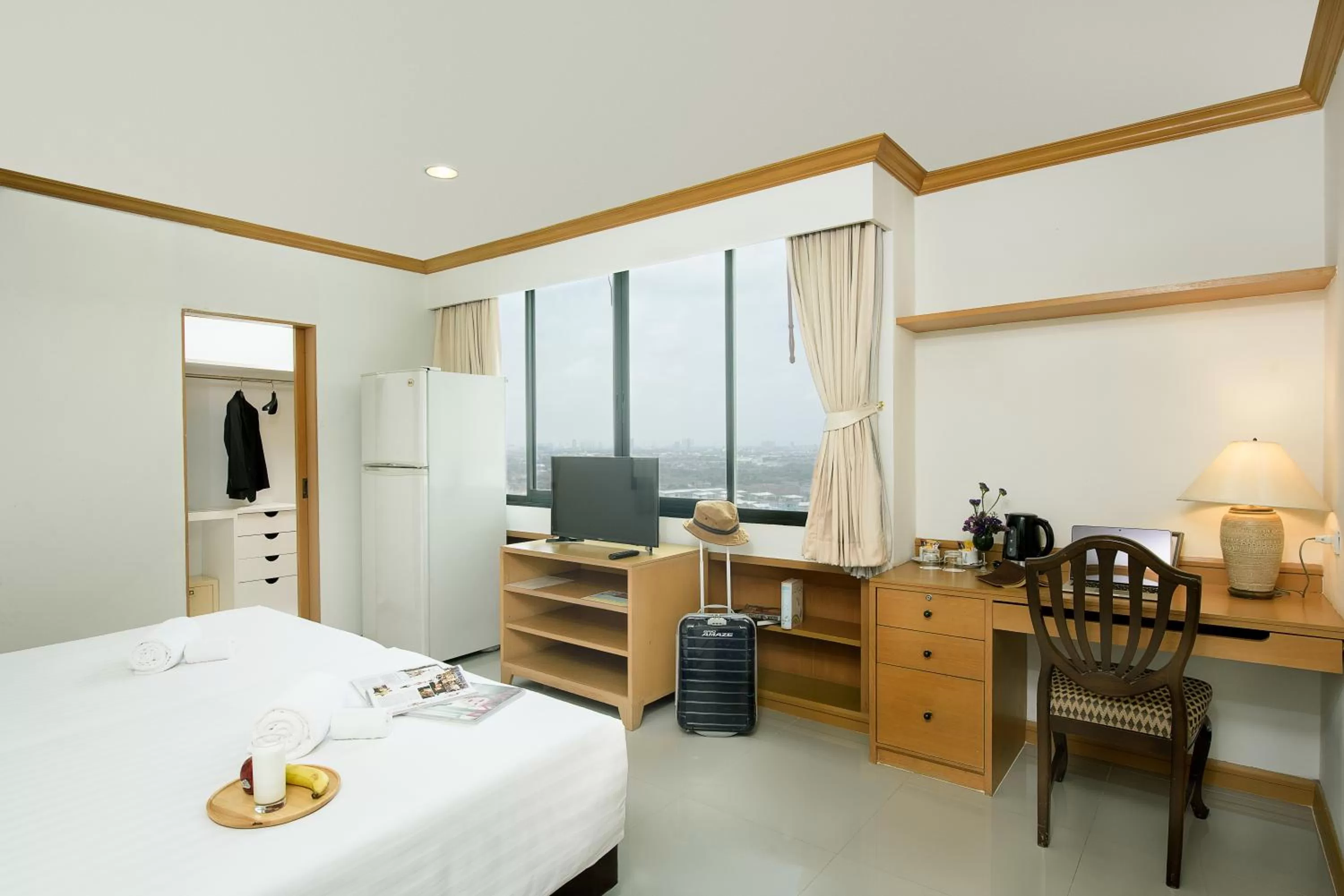 Bed in Riverine Place Hotel and Residence