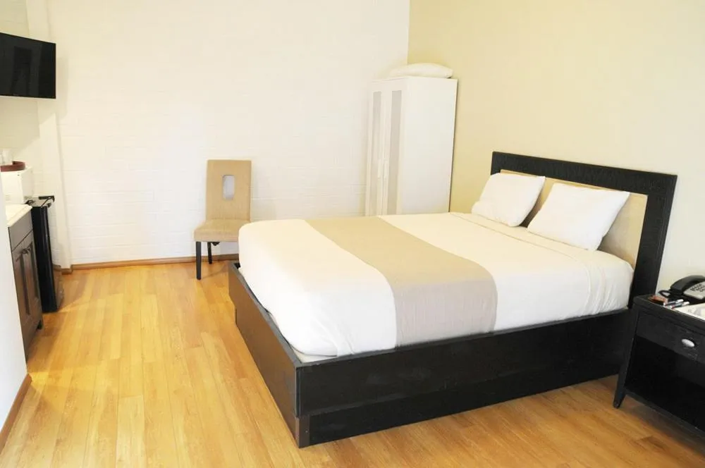 Bed in CCBC Resort Hotel - A Gay Men's Resort