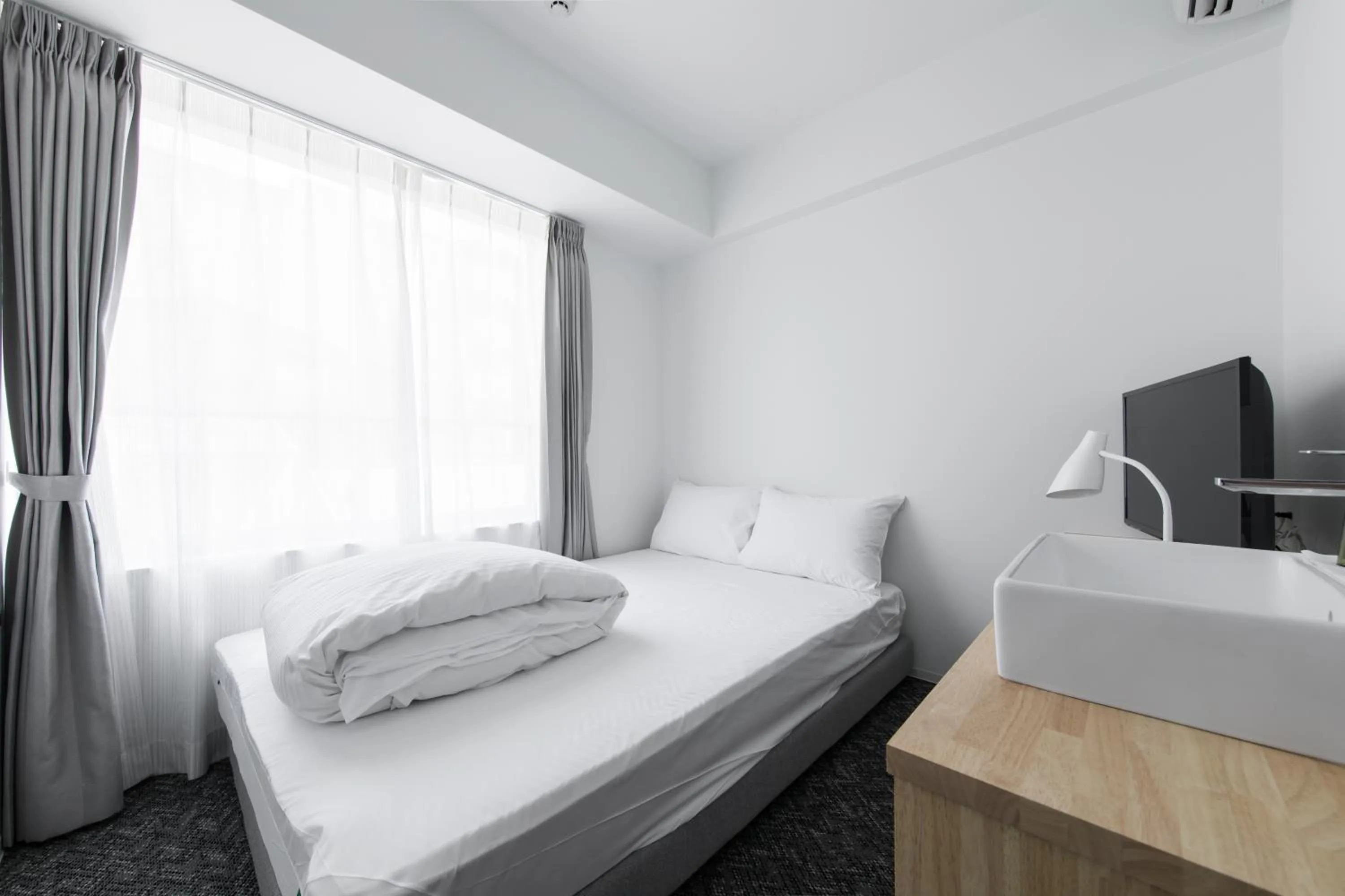 Bed in Imu Hotel Kyoto