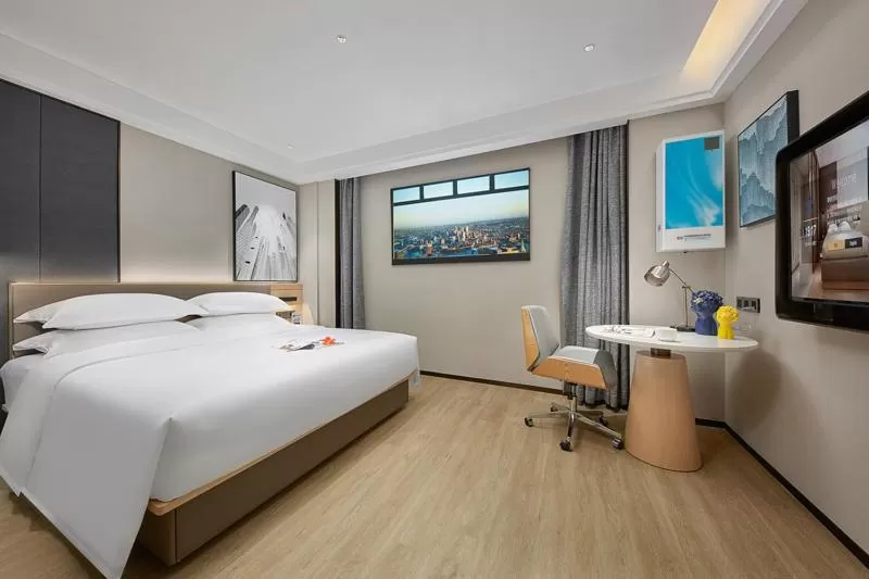 Photo of the whole room, Bed in Fengyue Light Shang Hotel Guangzhou Baiyun Airport Store