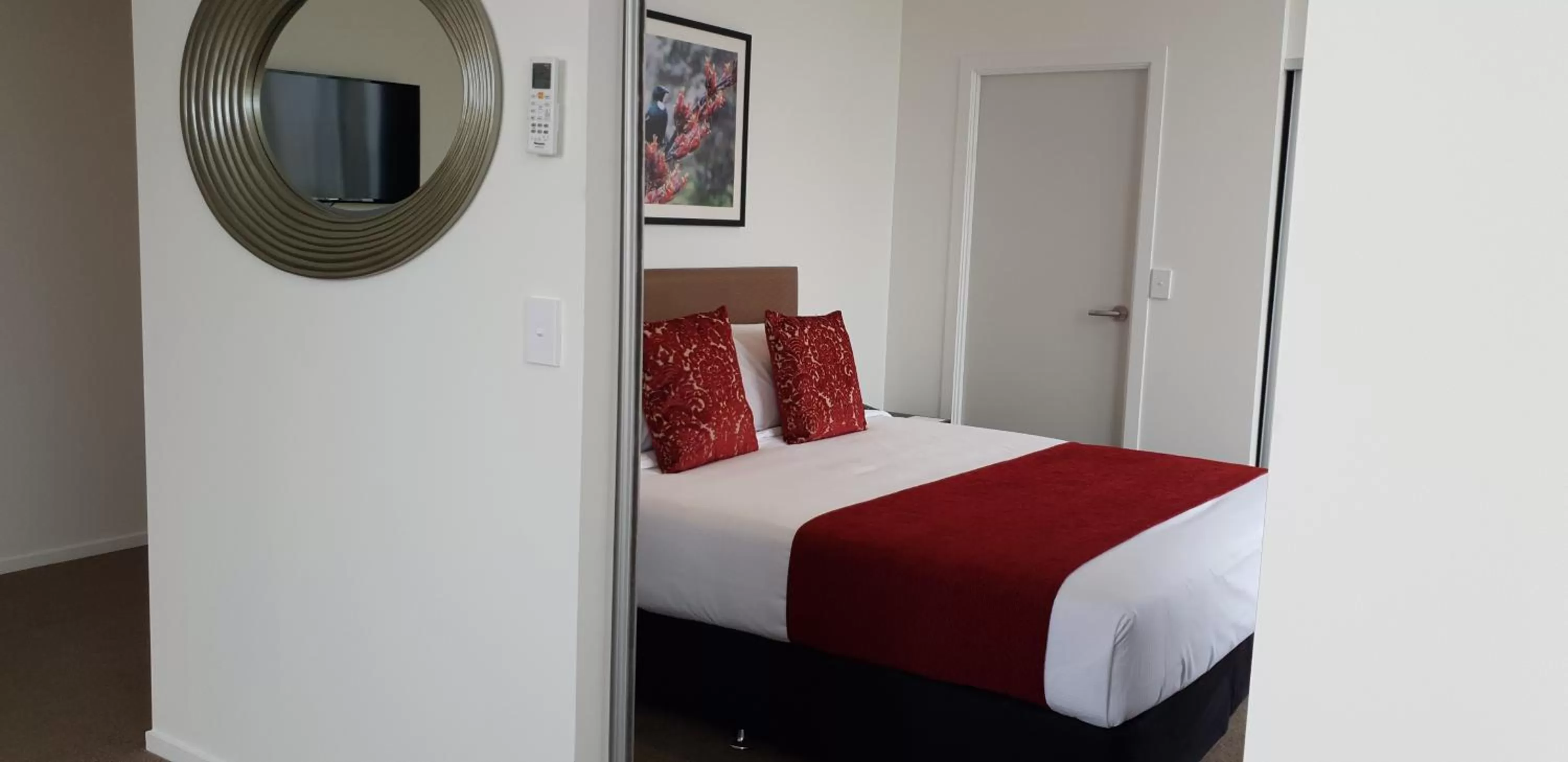 Bedroom, Bed in Ramada Suites by Wyndham Auckland Manukau Pacfic Centre