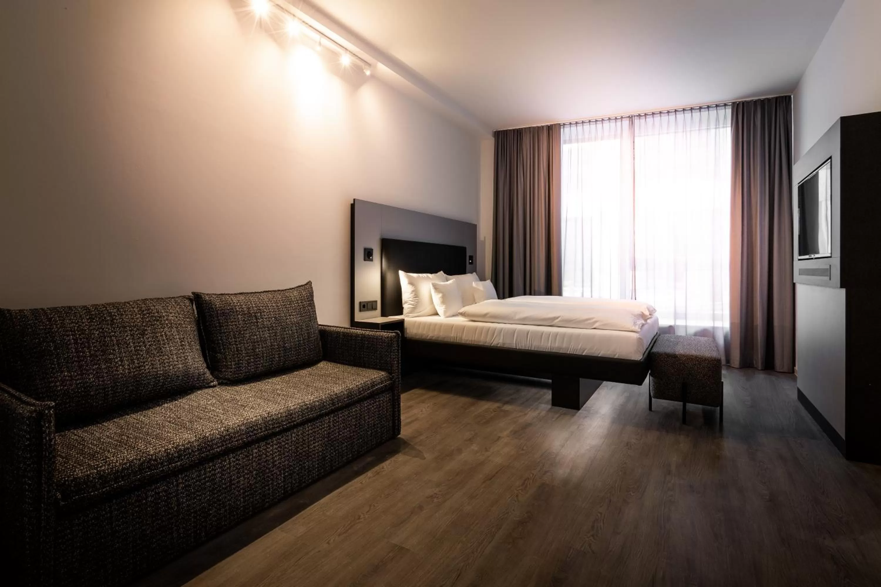 Photo of the whole room, Bed in GINN Apartment-Hotel Stuttgart-Esslingen